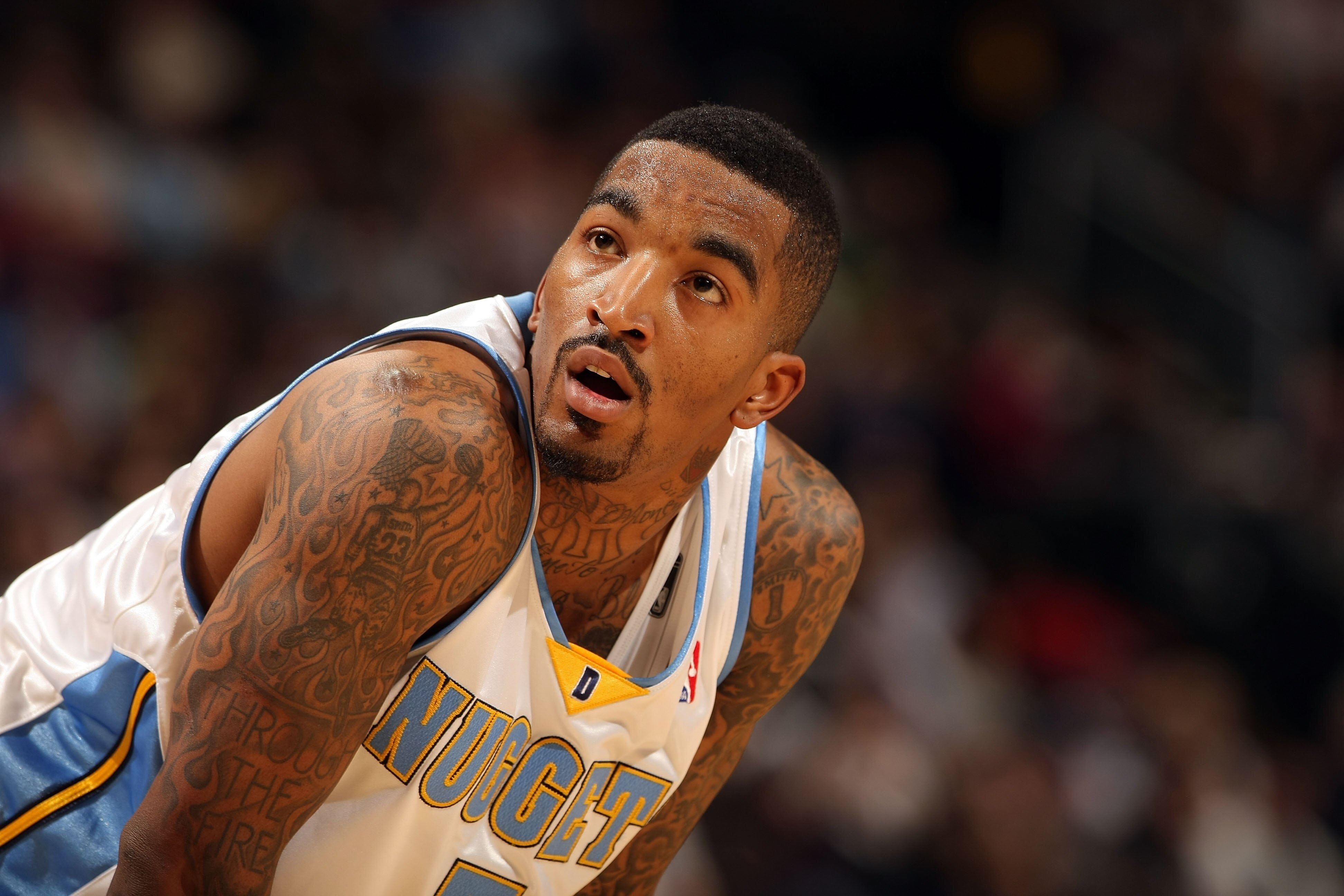 DENVER - JANUARY 05:  J.R. Smith #5 of the Denver Nuggets looks on during a break in the action against the Golden State Warriors at the Pepsi Center on January 5, 2010 in Denver, Colorado. The Nuggets defeated the Warriors 123-122. NOTE TO USER: User exp