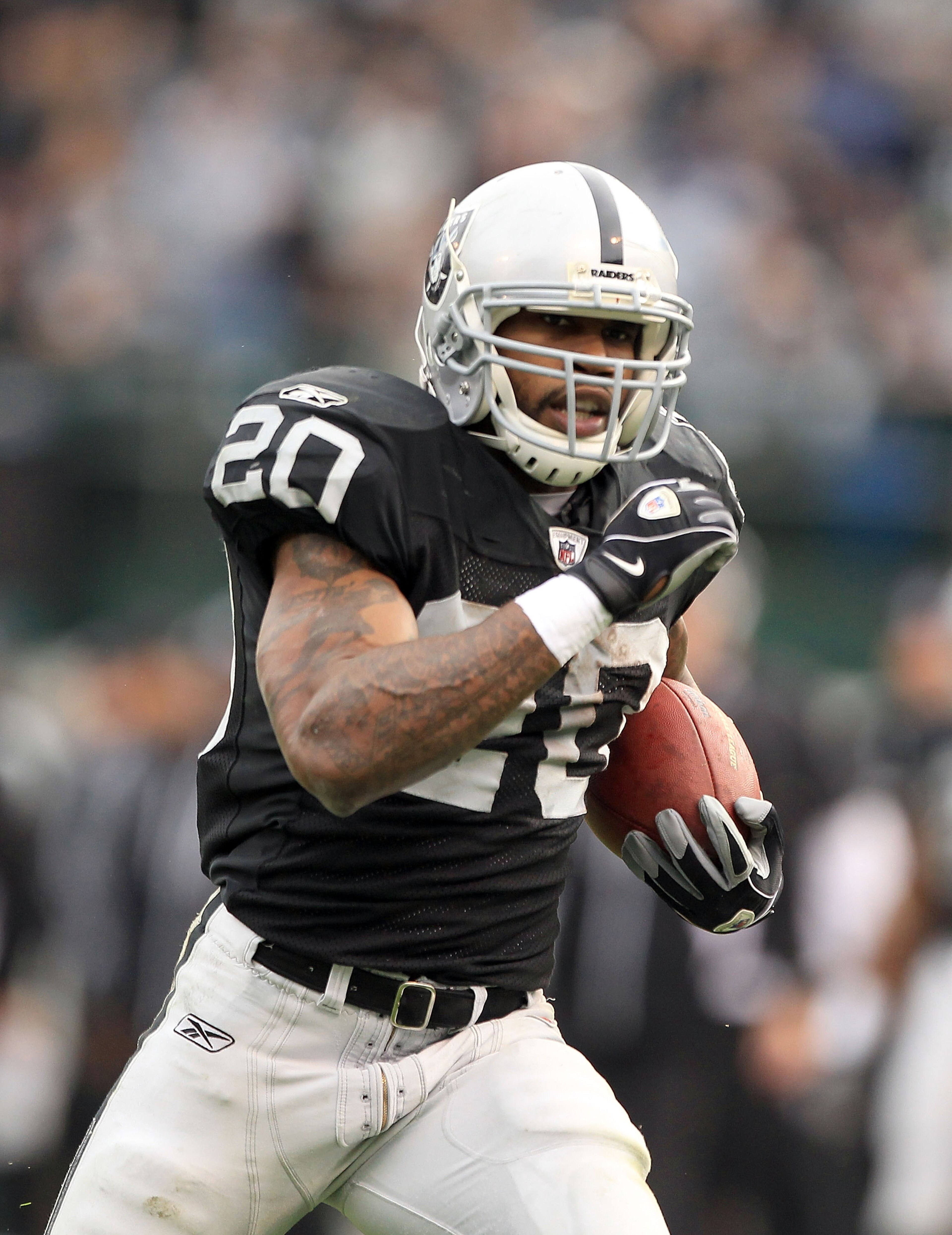 OAKLAND, CA - DECEMBER 19: Darren McFadden #20 of the Oakland Raiders runs with the ball during their game against the Denver Broncos at Oakland-Alameda County Coliseum on December 19, 2010 in Oakland, California. (Photo by Ezra Shaw/Getty Images) OAKLAND, CA - DECEMBER 19: Darren McFadden #20 of the Oakland Raiders runs with the ball during their game against the Denver Broncos at Oakland-Alameda County Coliseum on December 19, 2010 in Oakland, California. (Photo by Ezra Shaw/Getty Images)