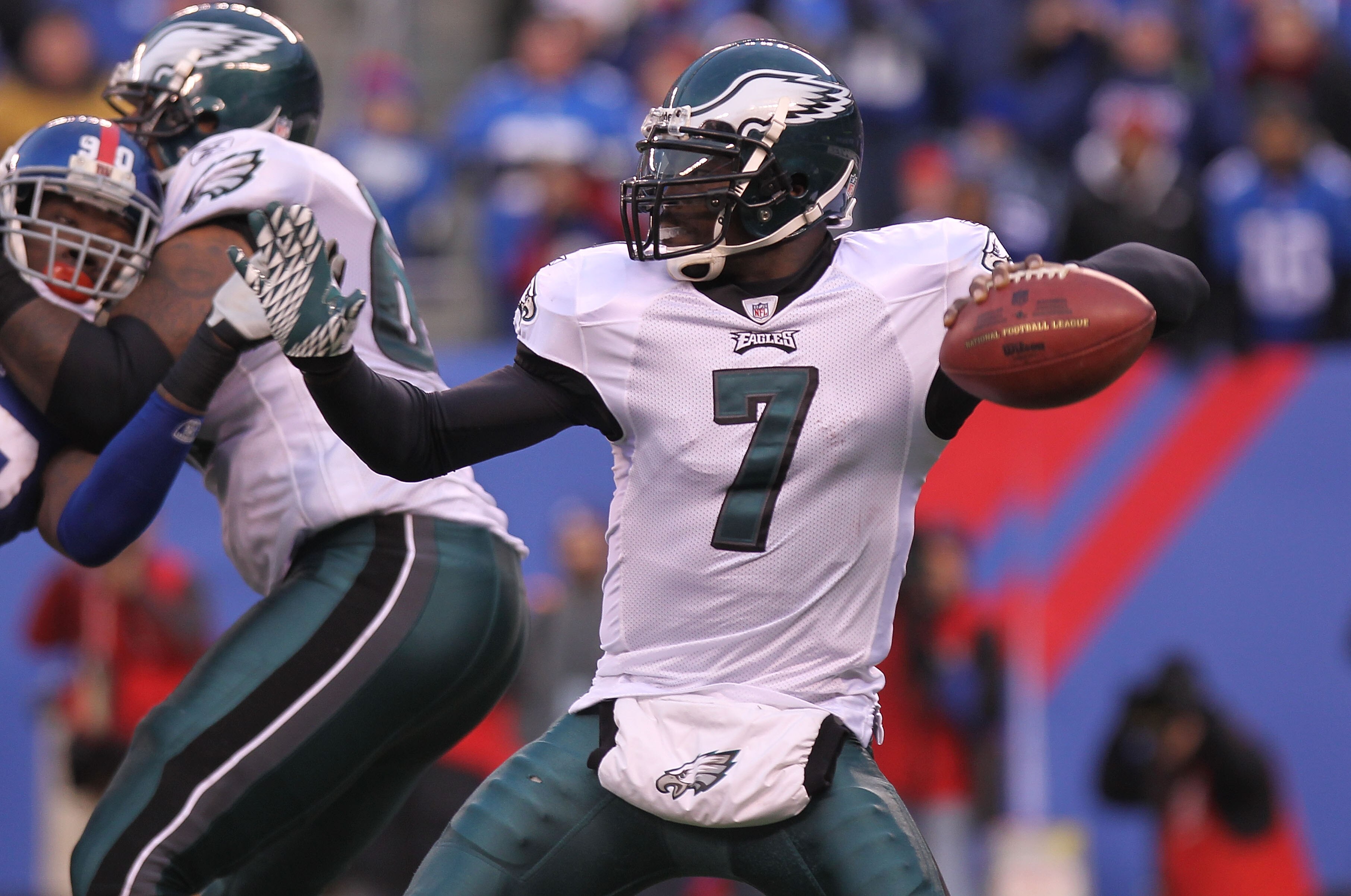 EAST RUTHERFORD, NJ - DECEMBER 19:  Michael Vick #7 of the Philadelphia Eagles passes against the New York Giants at New Meadowlands Stadium on December 19, 2010 in East Rutherford, New Jersey.  (Photo by Nick Laham/Getty Images)