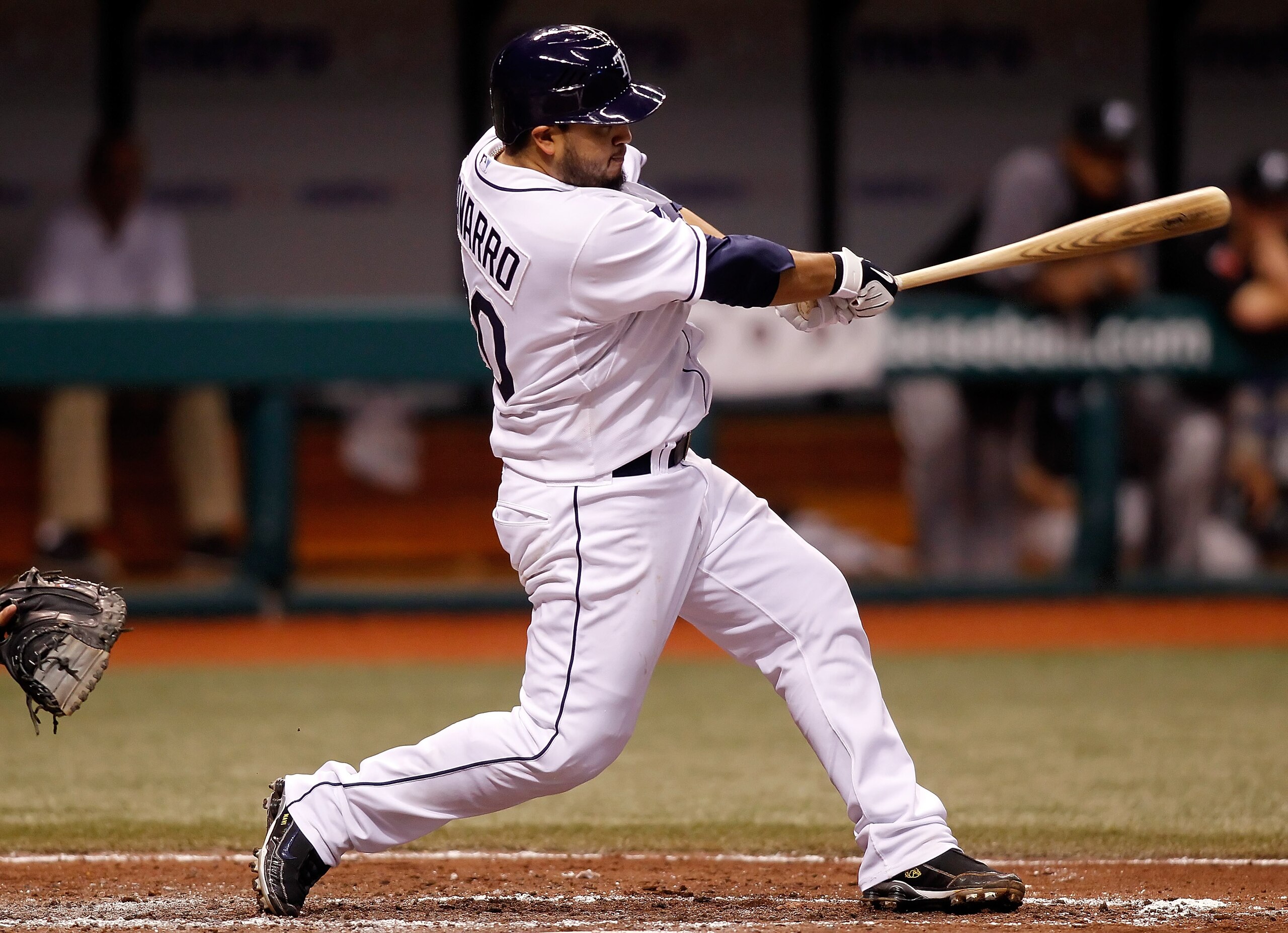 ST PETERSBURG, FL - JUNE 09: Catcher Dioner Navarro #30 of the Tampa Bay Rays hits a home run against the Toronto Blue Jays during the game at Tropicana Field on June 9, 2010 in St. Petersburg, Florida. (Photo by J. Meric/Getty Images) ST PETERSBURG, FL - JUNE 09: Catcher Dioner Navarro #30 of the Tampa Bay Rays hits a home run against the Toronto Blue Jays during the game at Tropicana Field on June 9, 2010 in St. Petersburg, Florida. (Photo by J. Meric/Getty Images)