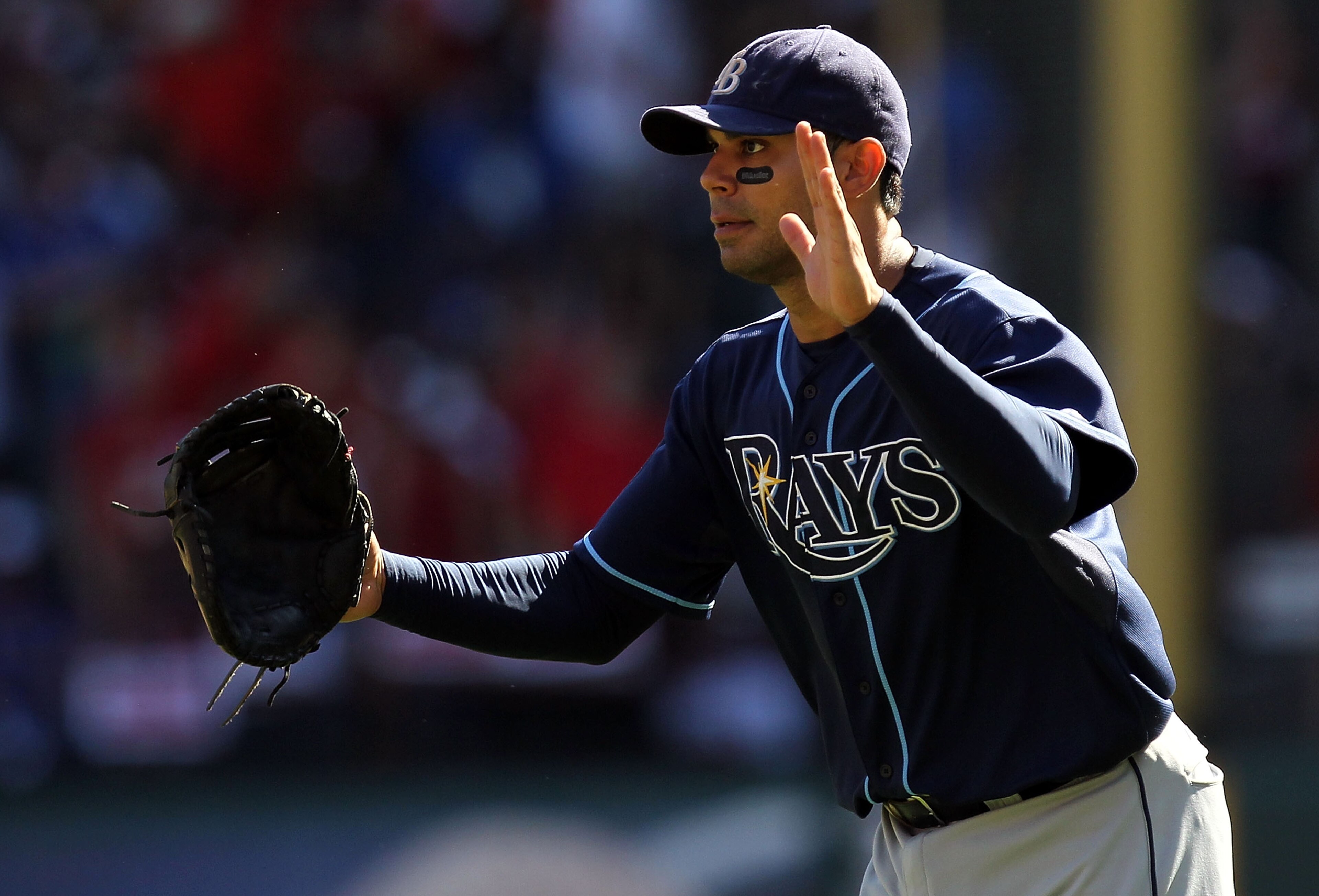 ARLINGTON, TX - OCTOBER 10: Carlos Pena #23 of the Tampa Bay Rays celebrates after a 5-2 win against the Texas Rangers during game 4 of the ALDS at Rangers Ballpark in Arlington on October 10, 2010 in Arlington, Texas. (Photo by Ronald Martinez/Getty Im ARLINGTON, TX - OCTOBER 10: Carlos Pena #23 of the Tampa Bay Rays celebrates after a 5-2 win against the Texas Rangers during game 4 of the ALDS at Rangers Ballpark in Arlington on October 10, 2010 in Arlington, Texas. (Photo by Ronald Martinez/Getty Im