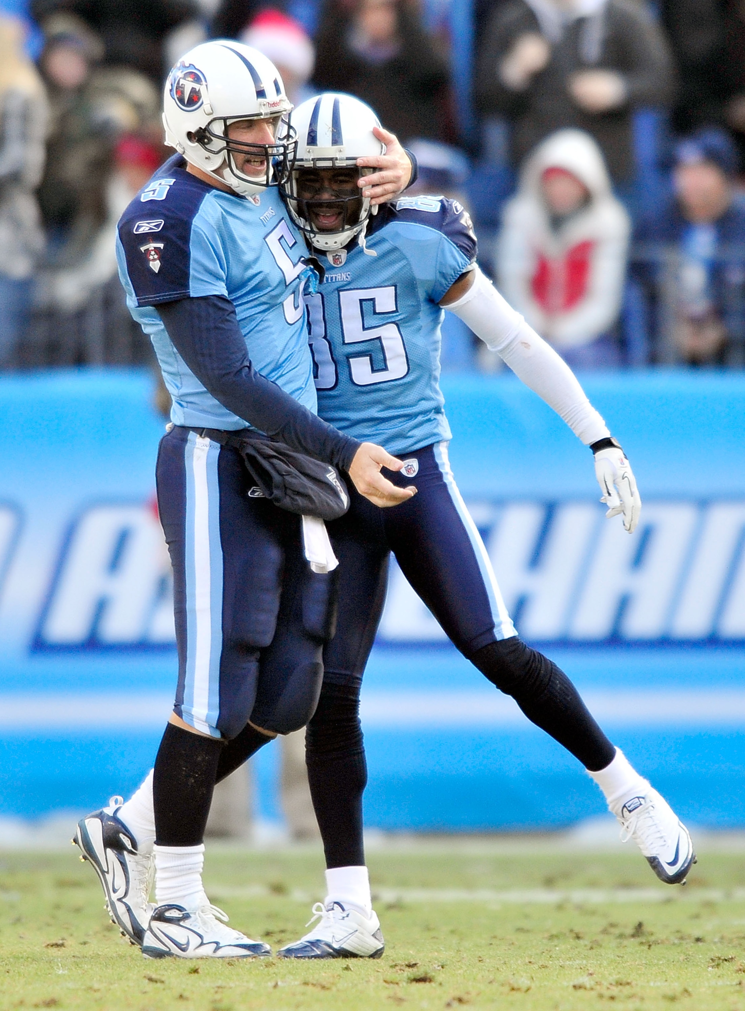 NASHVILLE, TN - DECEMBER 19:  Kerry Collins #5 and Nate Washington #85 of the Tennessee Titans celebrate after a touchdown by teammate Chris Johnson against the Houston Texans at LP Field on December 19, 2010 in Nashville, Tennessee. The Titans defeated t