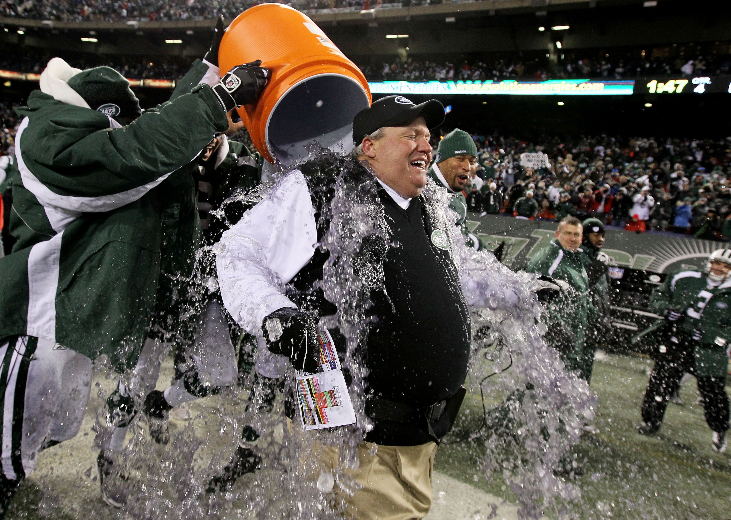 EAST RUTHERFORD, NJ - JANUARY 03:  Rex Ryan, Head Coach of the New York Jets, has Gatorade dumped on him by players at the end of the fourth quarter in celebration of their 37-0 victory over the Cincinnati Bengals at Giants Stadium on January 3, 2010 in E