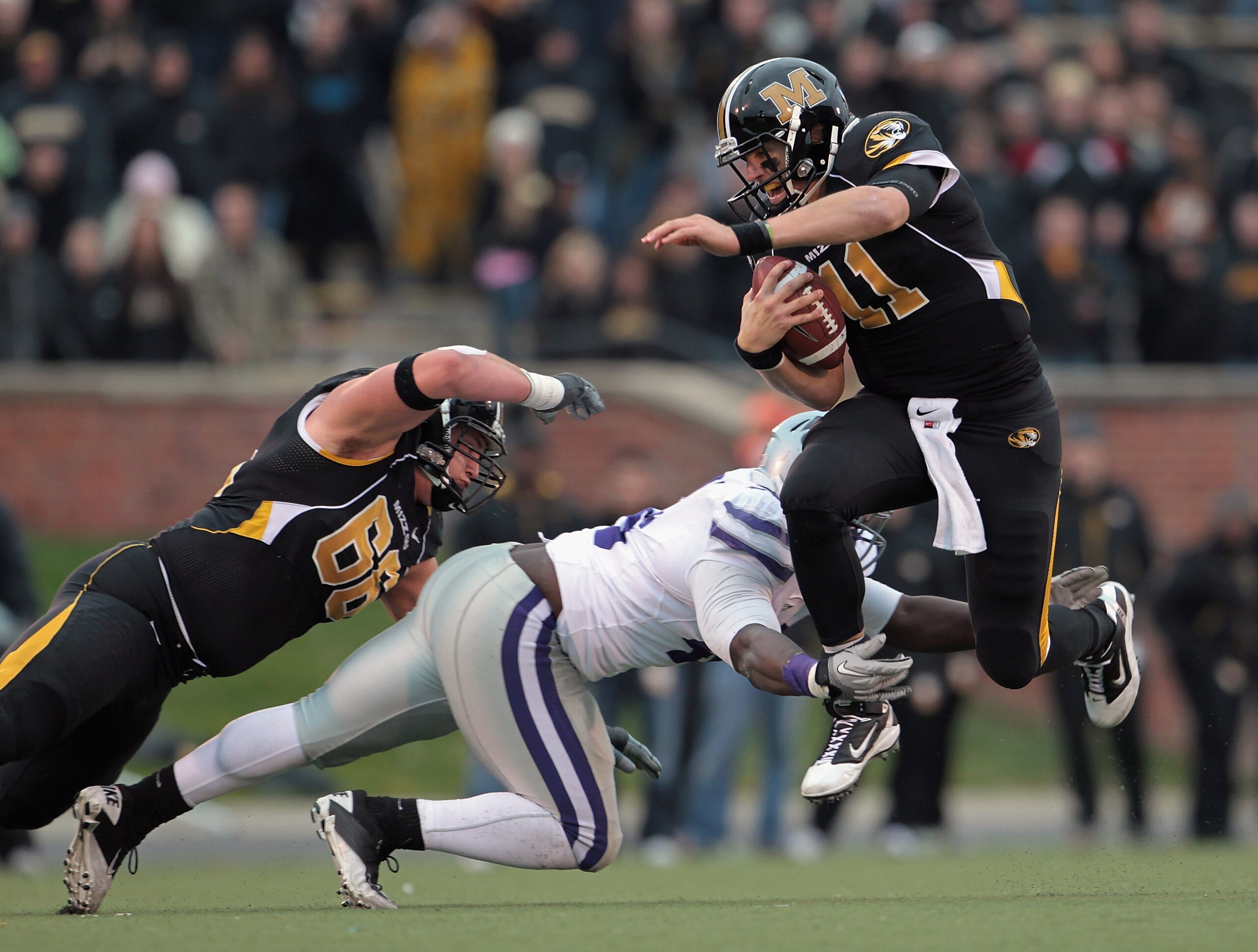 COLUMBIA, MO - NOVEMBER 13:  Quarterback Blaine Gabbert #11 of the Missouri Tigers carries the ball during the game against the Kansas State Wildcats on November 13, 2010 at Faurot Field/Memorial Stadium in Columbia, Missouri.  (Photo by Jamie Squire/Gett
