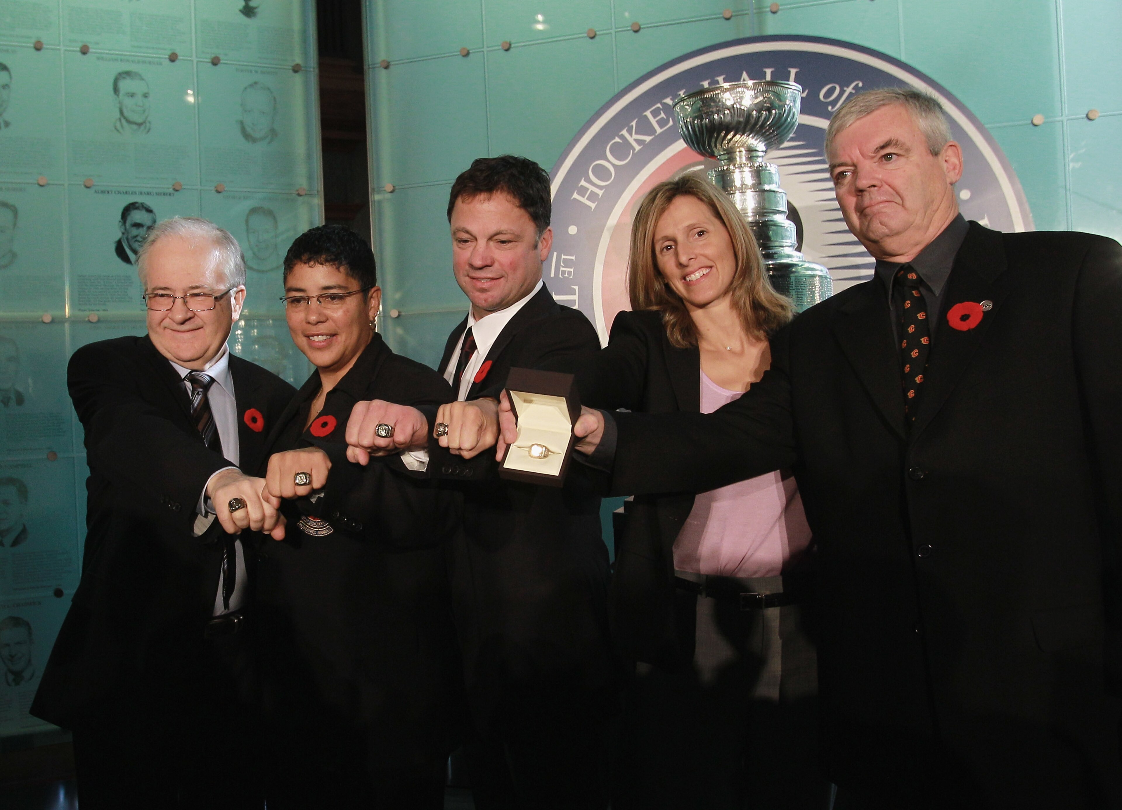 TORONTO, ON - NOVEMBER 08: (L-R) Jimmy Devellano, Angela James, Dino Ciccarelli, Cammi Granato, and Bob Seaman (representing Doc Seaman), appear at a media opportunity prior to their induction ceremony to the Hockey Hall of Fame on November 8, 2010 in To TORONTO, ON - NOVEMBER 08: (L-R) Jimmy Devellano, Angela James, Dino Ciccarelli, Cammi Granato, and Bob Seaman (representing Doc Seaman), appear at a media opportunity prior to their induction ceremony to the Hockey Hall of Fame on November 8, 2010 in To