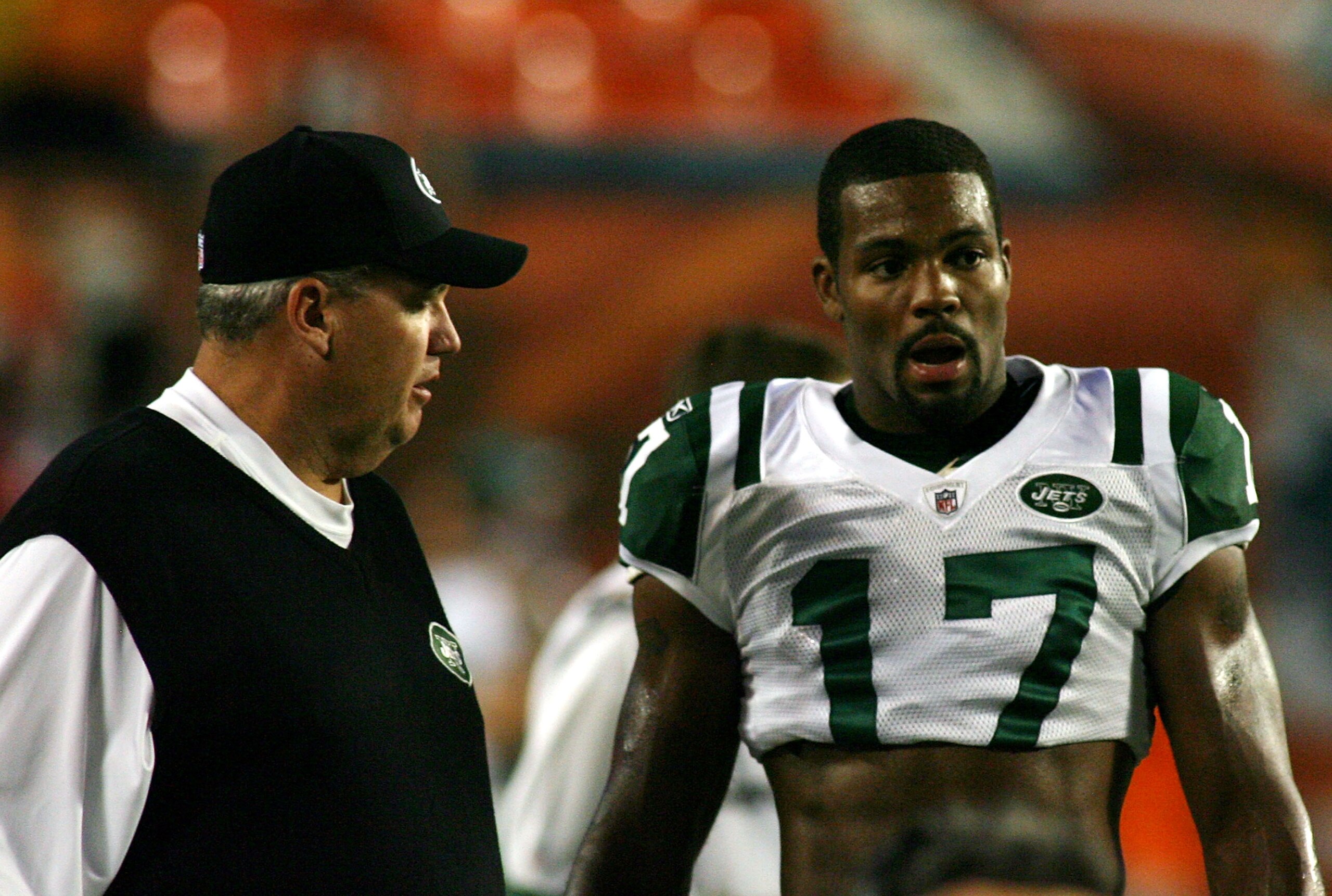 MIAMI - SEPTEMBER 26:  Receiver Braylon Edwards #17 and head coach Rex Ryan (L) of the New York Jets chat during warms up prior to playing the Miami Dolphins at Sun Life Stadium on September 26, 2010 in Miami, Florida.  (Photo by Marc Serota/Getty Images)
