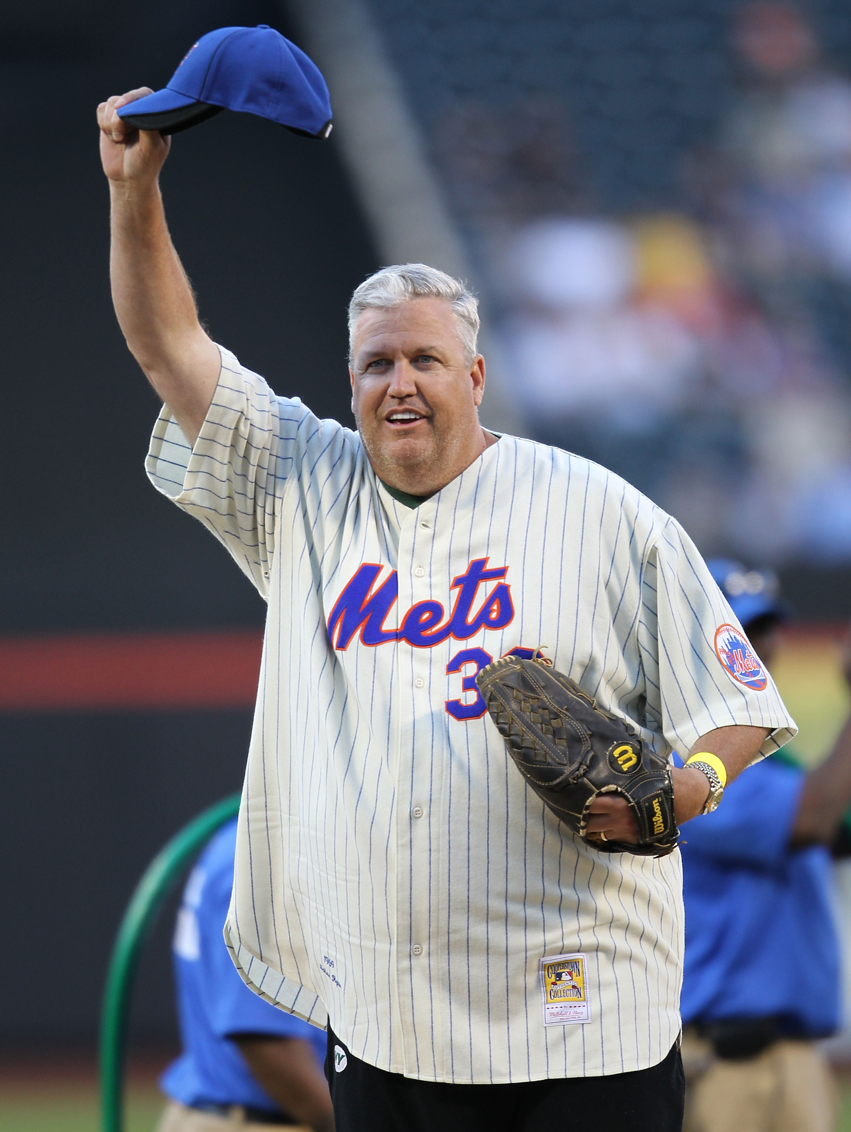 NEW YORK - JUNE 08:  New York Jets head coach, Rex Ryan, throws out the ceremonial first pitch prior to the game between the New York Mets and the San Diego Padres on June 8, 2010 in the Flushing neighborhood of the Queens borough of New York City.  (Phot