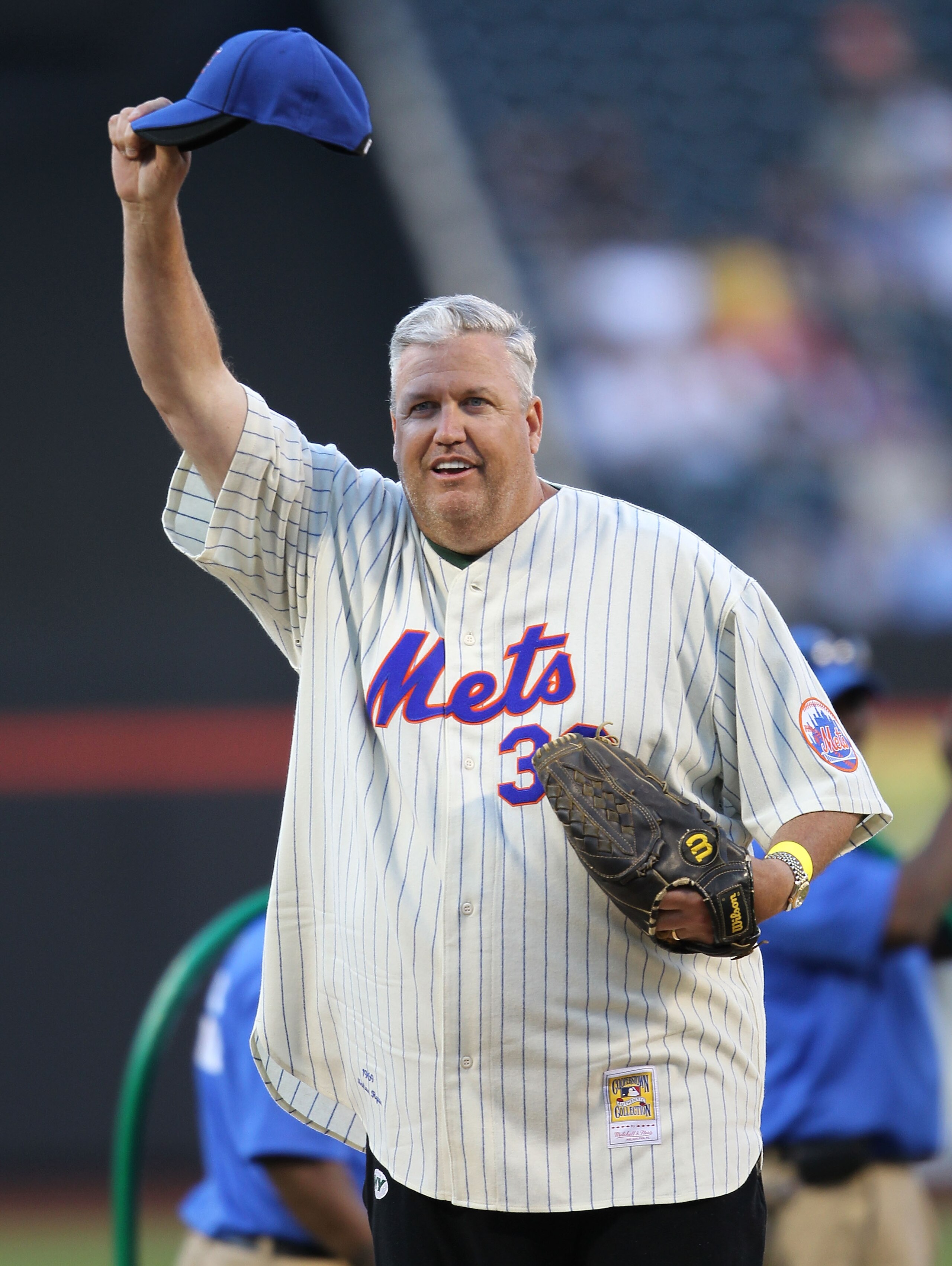 NEW YORK - JUNE 08:  New York Jets head coach, Rex Ryan, throws out the ceremonial first pitch prior to the game between the New York Mets and the San Diego Padres on June 8, 2010 in the Flushing neighborhood of the Queens borough of New York City.  (Phot