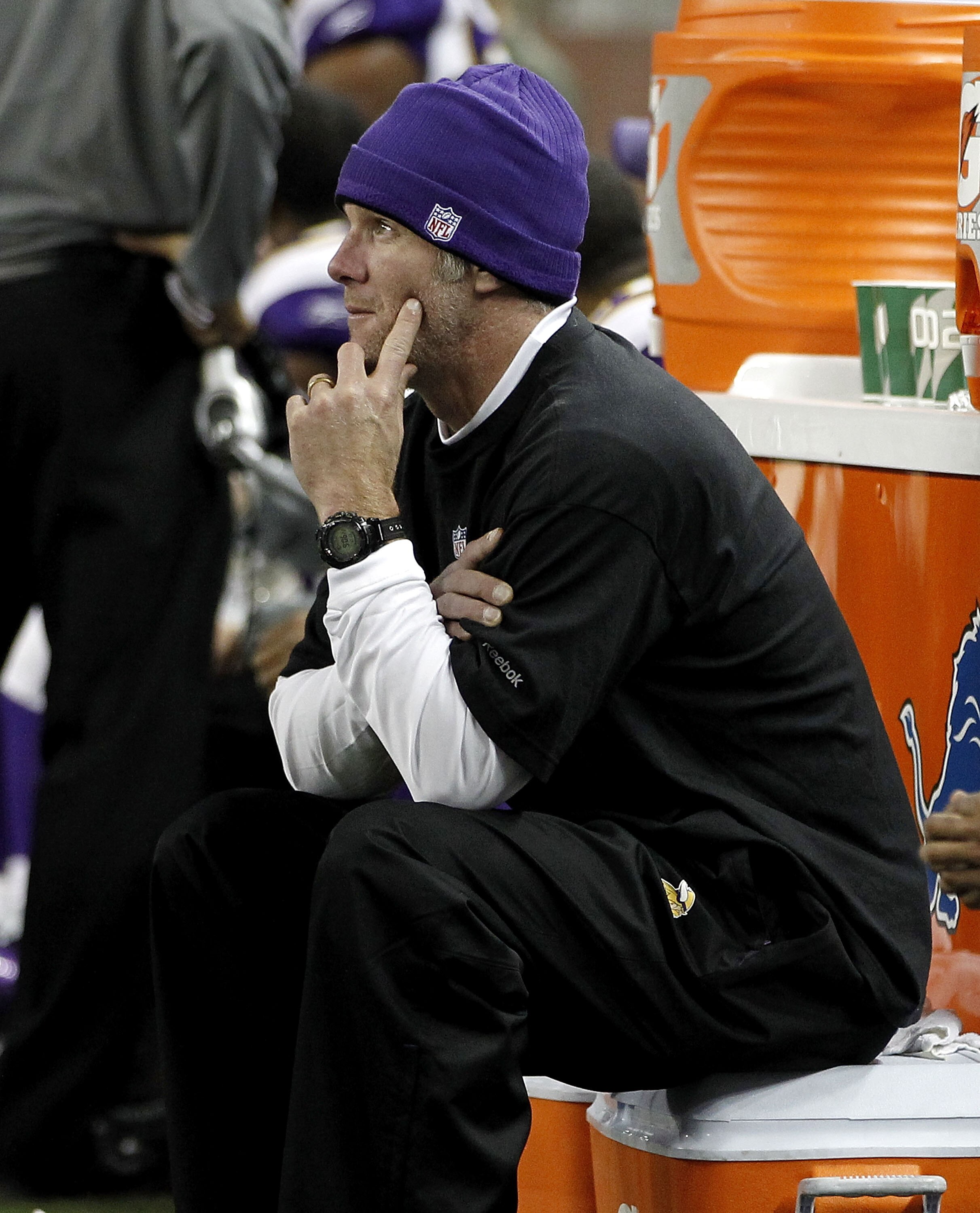 DETROIT, MI - DECEMBER 13:  Brett Favre #4 of the Minnesota Vikings looks on from the bench while playing the New York Giants at Ford Field on December 13, 2010 in Detroit, Michigan. New York won the game 21-3.  (Photo by Gregory Shamus/Getty Images)