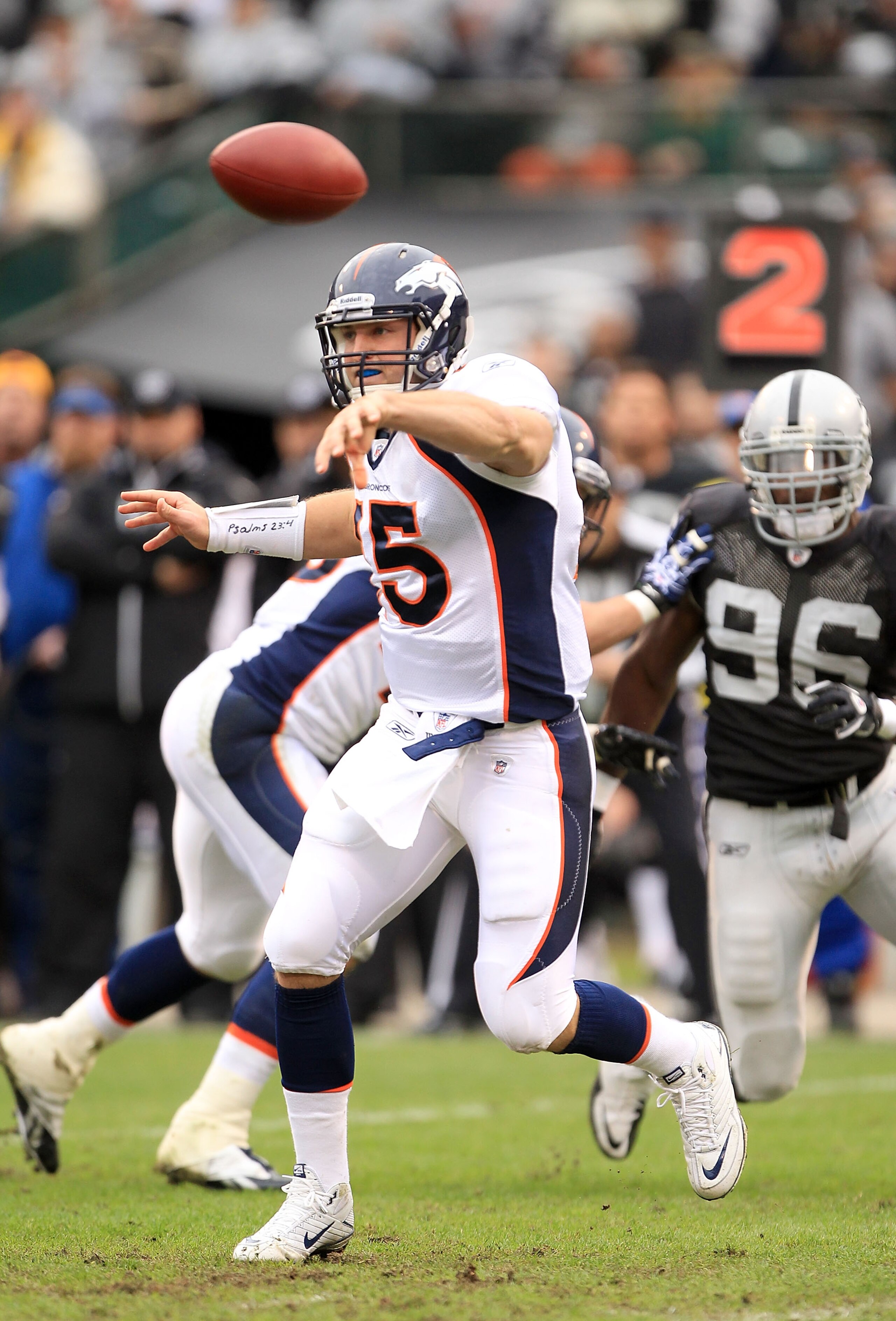 OAKLAND, CA - DECEMBER 19:  Tim Tebow #15 of the Denver Broncos in action during their game against the Oakland Raiders at Oakland-Alameda County Coliseum on December 19, 2010 in Oakland, California.  (Photo by Ezra Shaw/Getty Images)