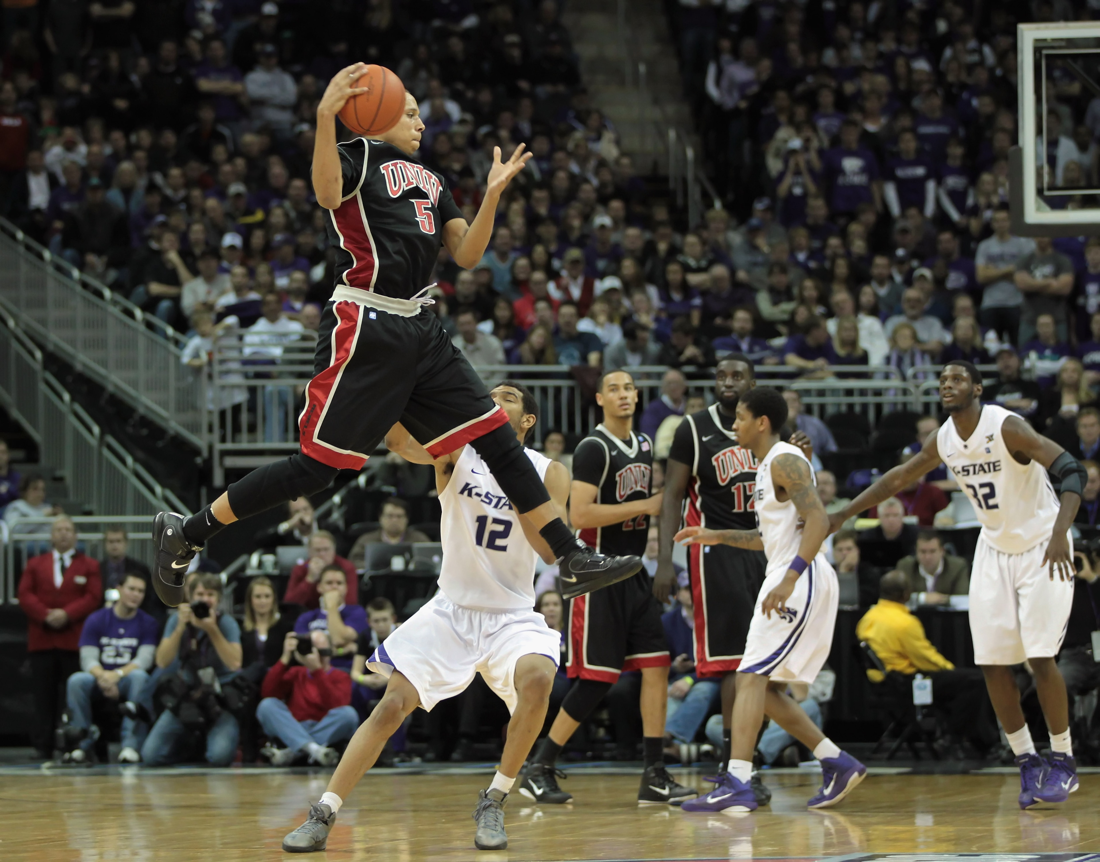 KANSAS CITY, MO - DECEMBER 21: Derrick Jasper #5 of the UNLV Rebels grabs a pass against the Kansas State Wildcats during the game on December 21, 2010 at the Sprint Center in Kansas City, Missouri. (Photo by Jamie Squire/Getty Images) KANSAS CITY, MO - DECEMBER 21: Derrick Jasper #5 of the UNLV Rebels grabs a pass against the Kansas State Wildcats during the game on December 21, 2010 at the Sprint Center in Kansas City, Missouri. (Photo by Jamie Squire/Getty Images)