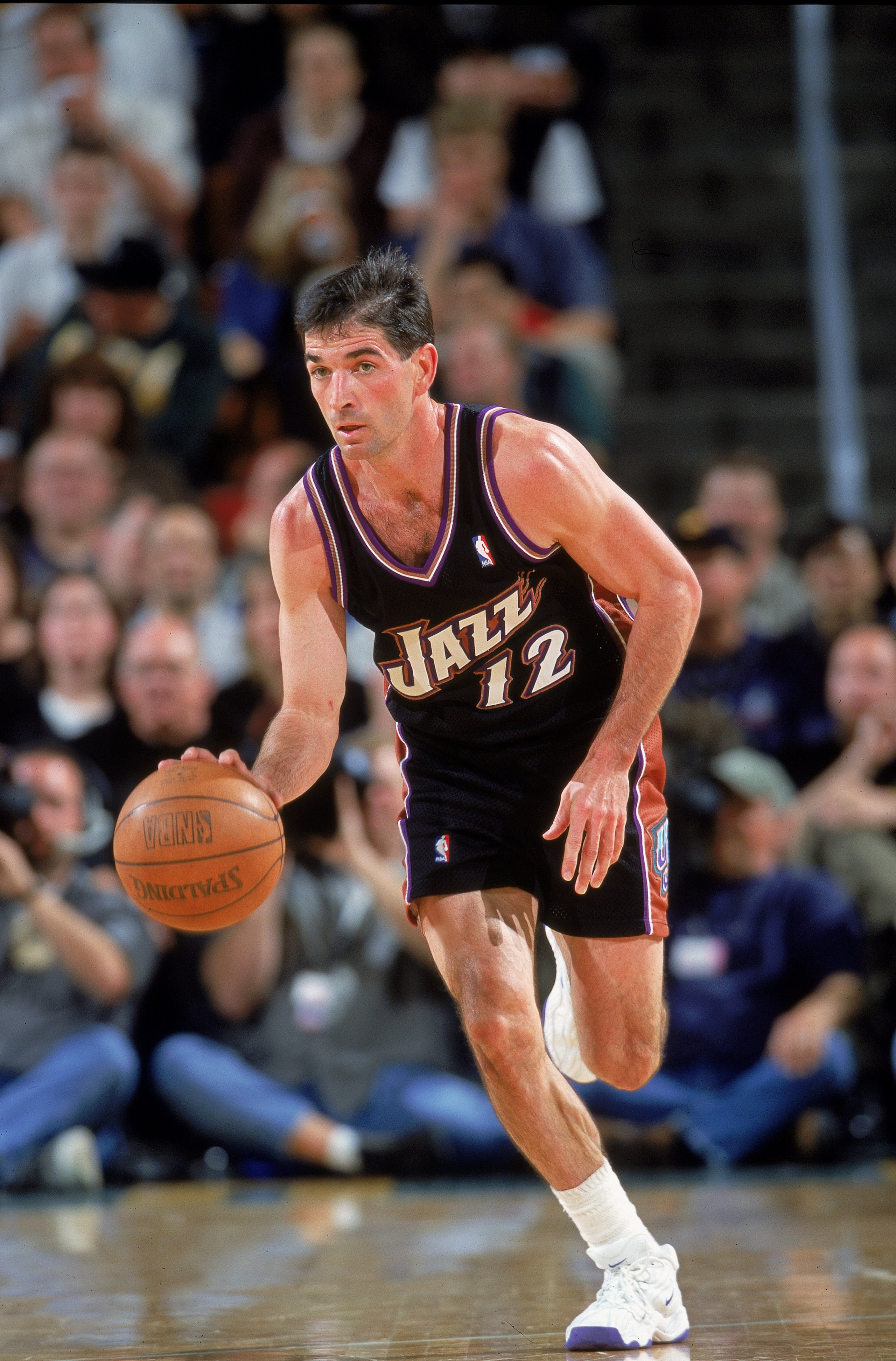3 May 2000:  John Stockton #12 of the Utah Jazz dribbles the ball down the court during the NBA Western Conference Playoffs Round One Game against the Seattle SuperSonics at Key Arena in Seattle, Washington. The SuperSonics defeated the Jazz 104-93  NOTE 