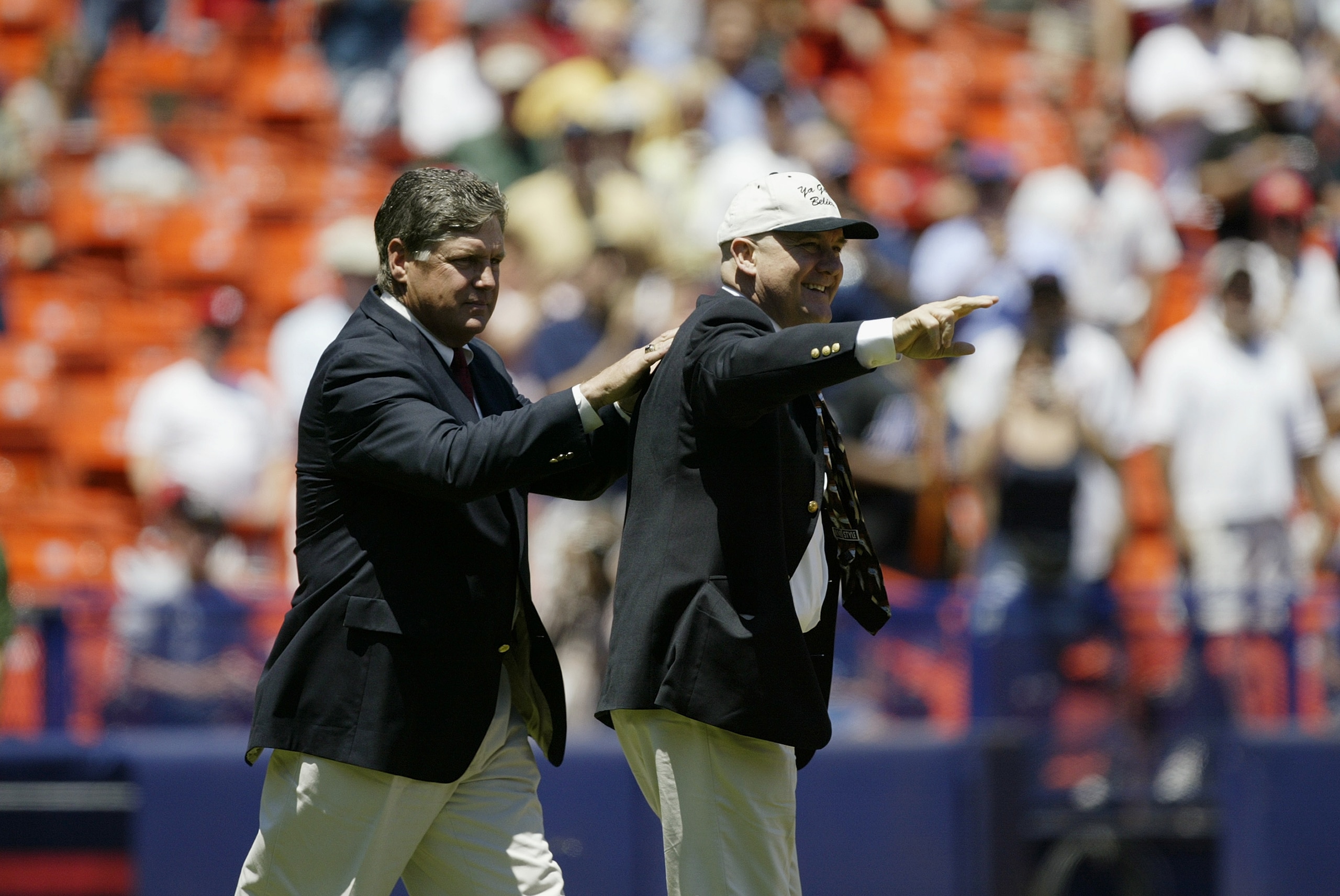 FLUSHING, NY - JULY 13:  (L-R) Tom Seaver and Tug McGraw, members of the 1973 New York Mets, wave to the fans in a ceremony honoring their team before the National League game between the New York Mets the Philadelphia Phillies at Shea Stadium on July 13,