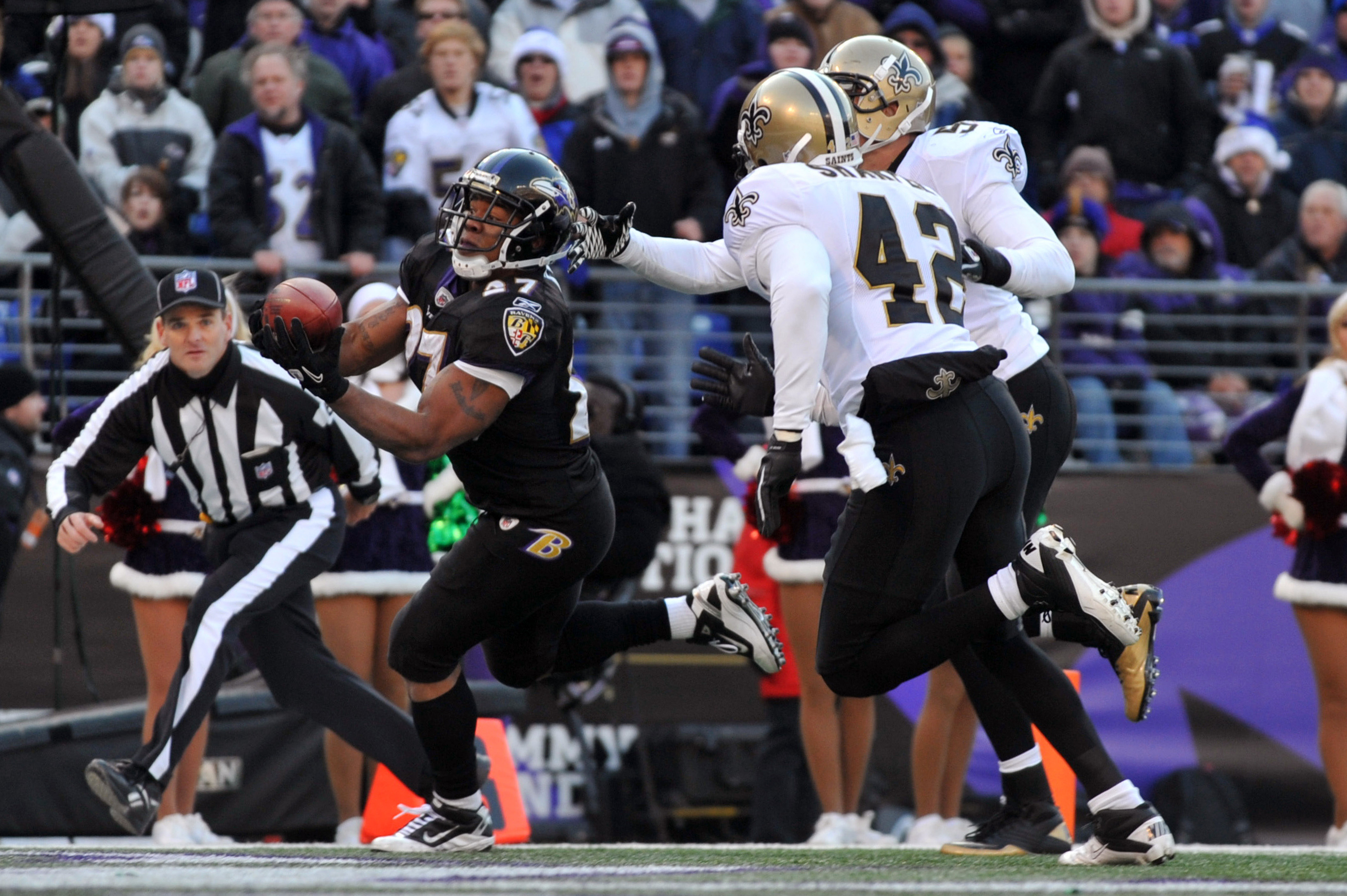 BALTIMORE, MD - DECEMBER 19:  Ray Rice #27 of the Baltimore Ravens score the Ravens third touchdown against the New Orleans Saints  at M&T Bank Stadium on December 19, 2010 in Baltimore, Maryland. The Ravens lead the Saints at the half 21-14. (Photo by La