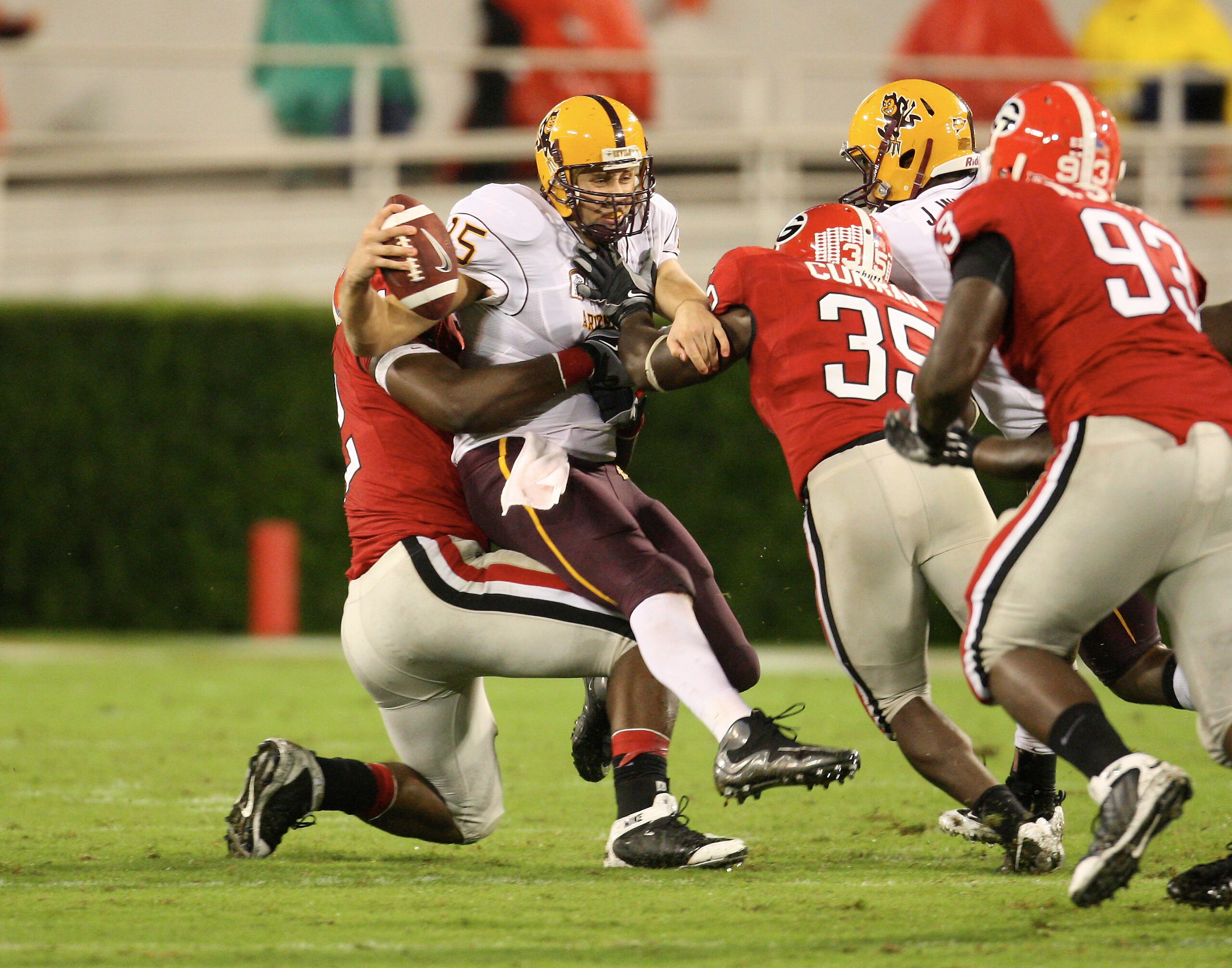 ATHENS, GA - SEPTEMBER 26: Danny Sullivan #15 of the Arizona State Sun Devils is sacked by Justin Houston #42 of the Georgia Bulldogs at Sanford Stadium on September 26, 2009 in Athens, Georgia. (Photo by Scott Cunningham/Getty Images)
