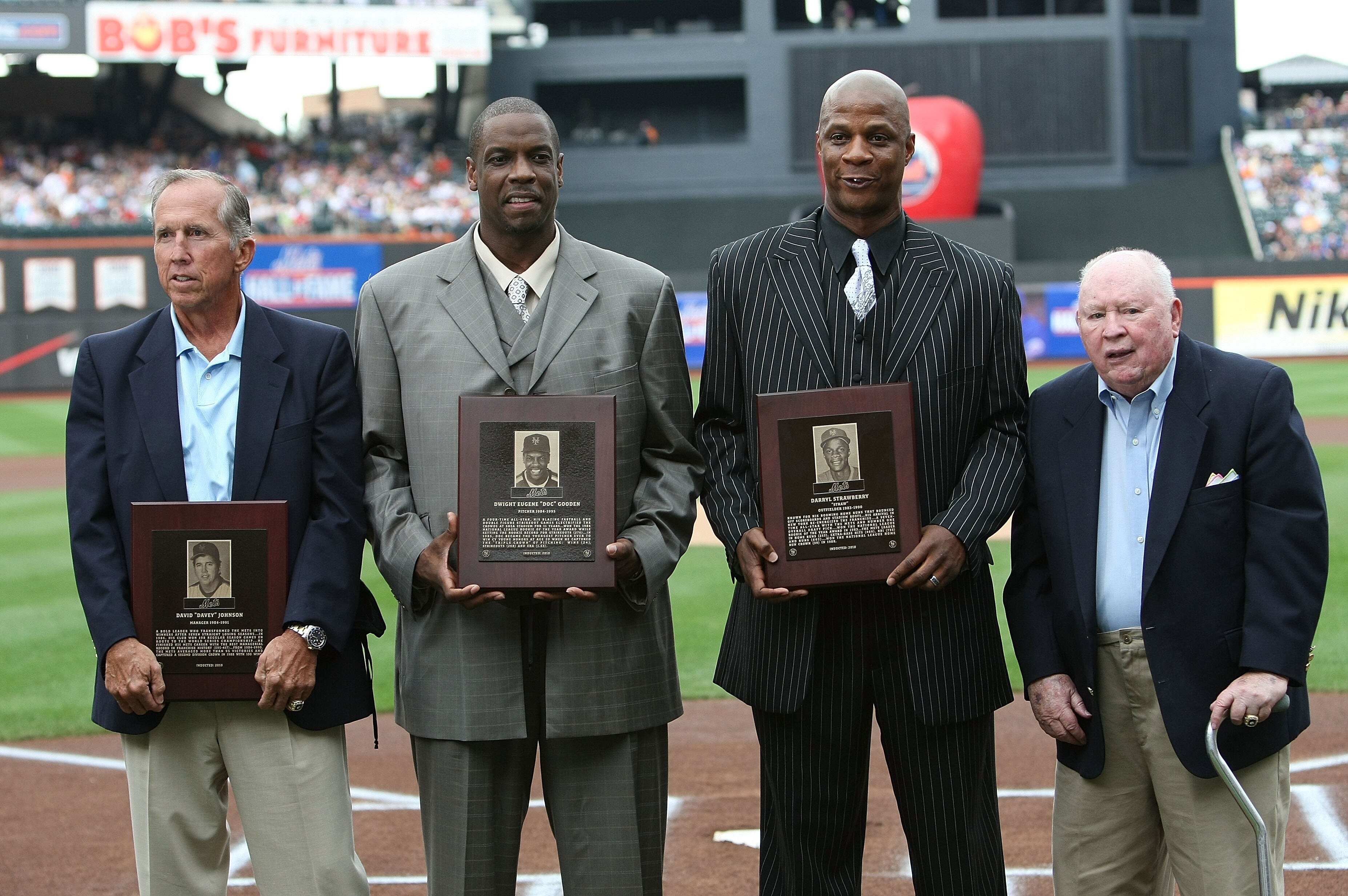 NEW YORK - AUGUST 01: Mets Hall of Fame inductees (L-R) Davey Johnson, Dwight Gooden, Darryl Strawberry and Frank Cashen pose for photographers prior to the game between the Arizona Diamondbacks and the New York Mets at Citi Field on August 1, 2010 in the