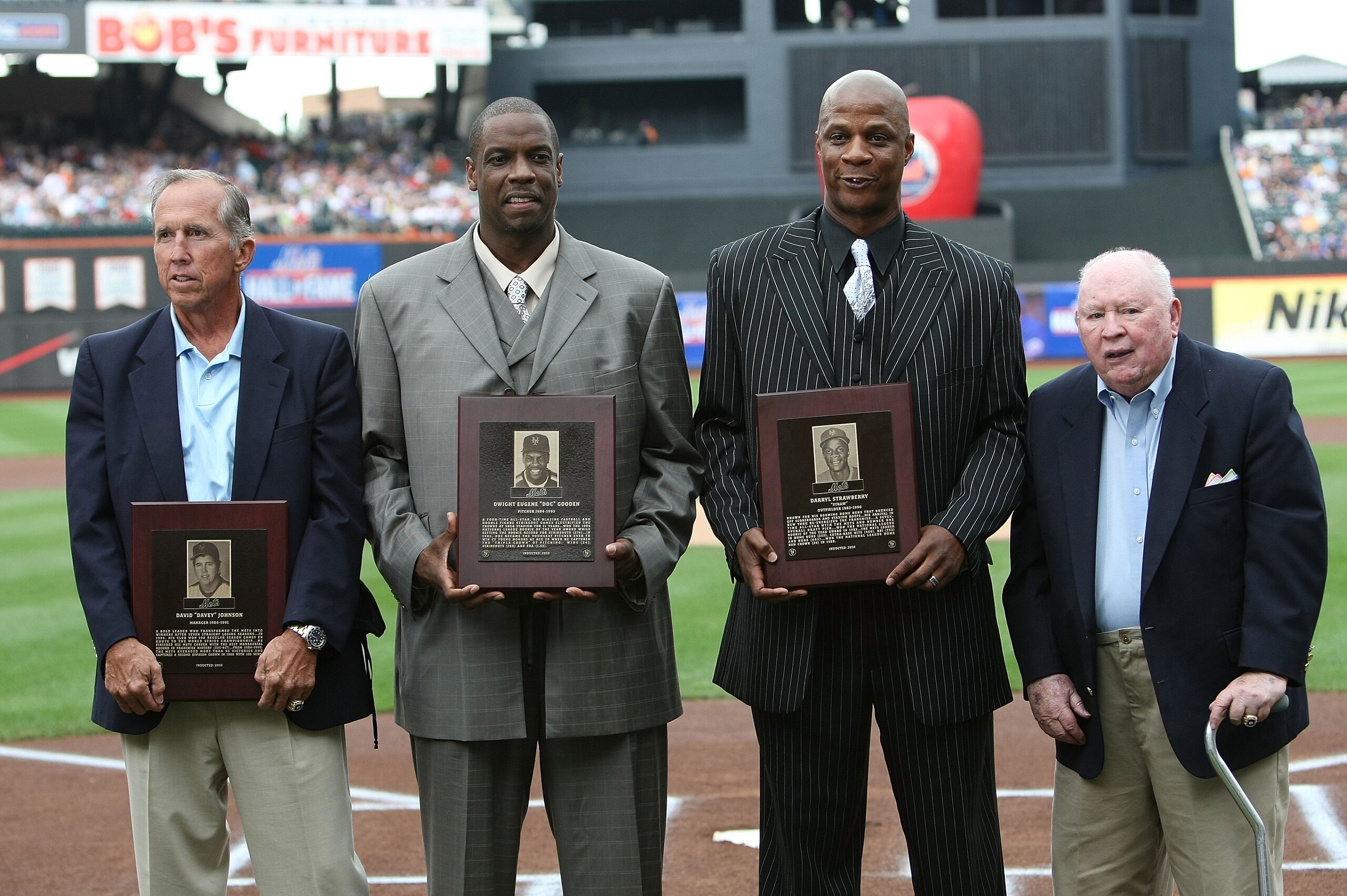 NEW YORK - AUGUST 01: Mets Hall of Fame inductees (L-R) Davey Johnson, Dwight Gooden, Darryl Strawberry and Frank Cashen pose for photographers prior to the game between the Arizona Diamondbacks and the New York Mets at Citi Field on August 1, 2010 in the