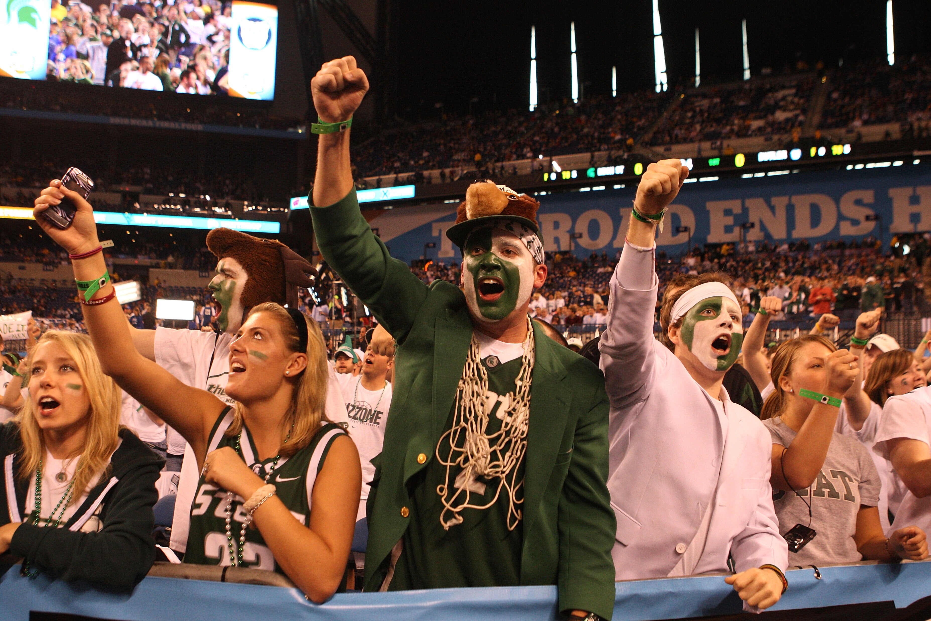 INDIANAPOLIS - APRIL 03:  Fans of the Michigan State Spartans support their team against the Butler Bulldogs during the National Semifinal game of the 2010 NCAA Division I Men's Basketball Championship on April 3, 2010 in Indianapolis, Indiana.  (Photo by