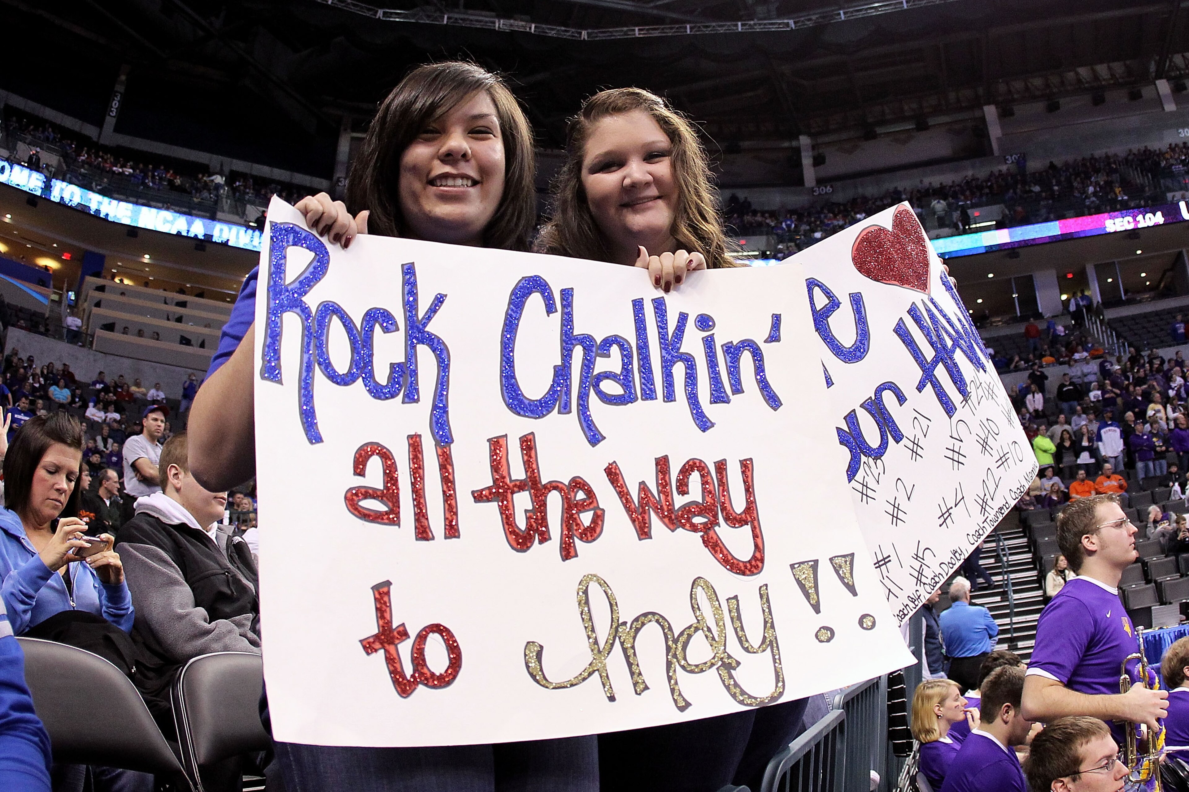 OKLAHOMA CITY - MARCH 20: Fans of the Kansas Jayhawks hold up signs which read 'Rock Chalkin all the way to Indy' against the Northern Iowa Panthers during the second round of the 2010 NCAA men's basketball tournament at Ford Center on March 20, 2010 in OKLAHOMA CITY - MARCH 20: Fans of the Kansas Jayhawks hold up signs which read 'Rock Chalkin all the way to Indy' against the Northern Iowa Panthers during the second round of the 2010 NCAA men's basketball tournament at Ford Center on March 20, 2010 in