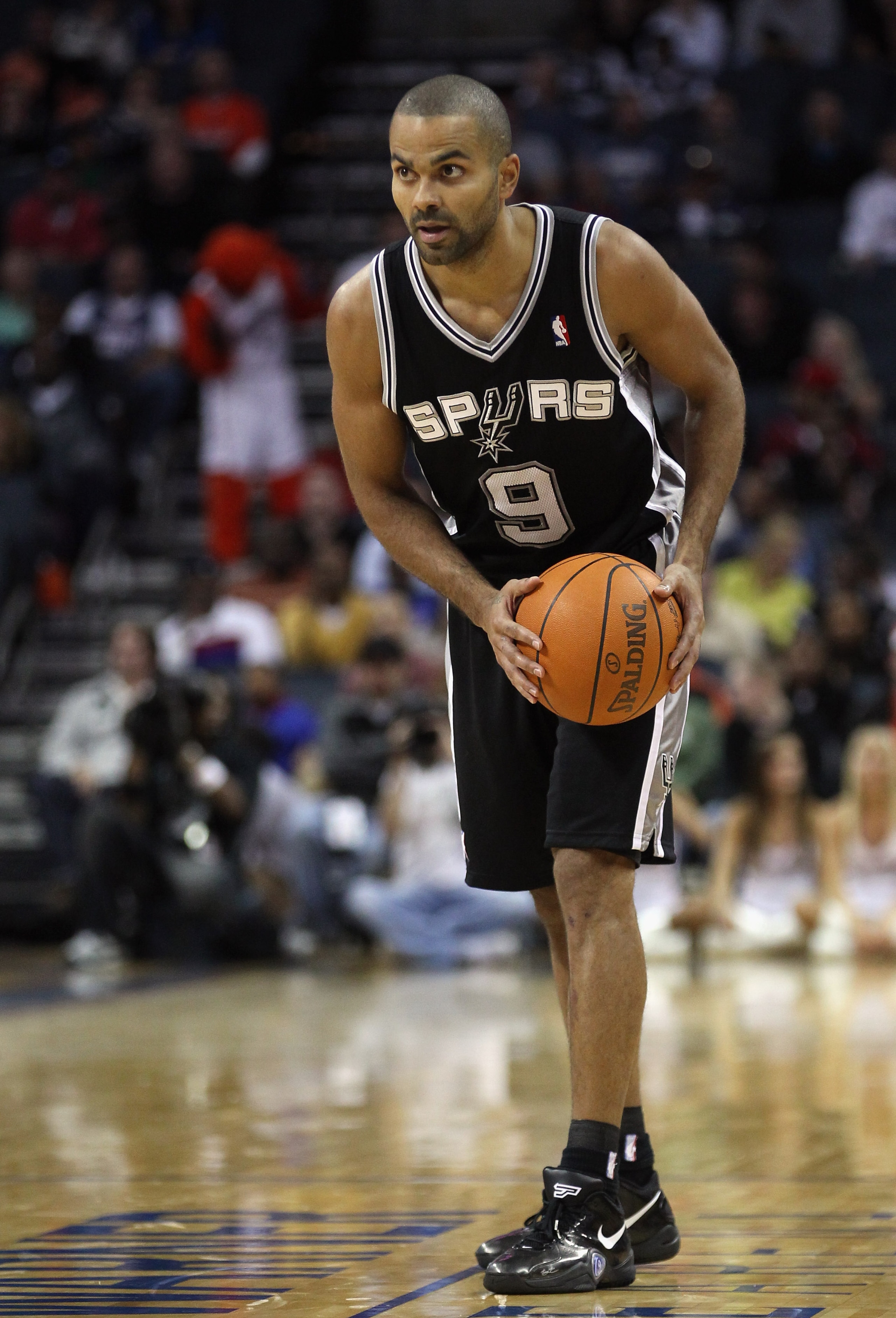 CHARLOTTE, NC - NOVEMBER 08:  Tony Parker #9 of the San Antonio Spurs against the Charlotte Bobcats during their game at Time Warner Cable Arena on November 8, 2010 in Charlotte, North Carolina.  NOTE TO USER: User expressly acknowledges and agrees that,