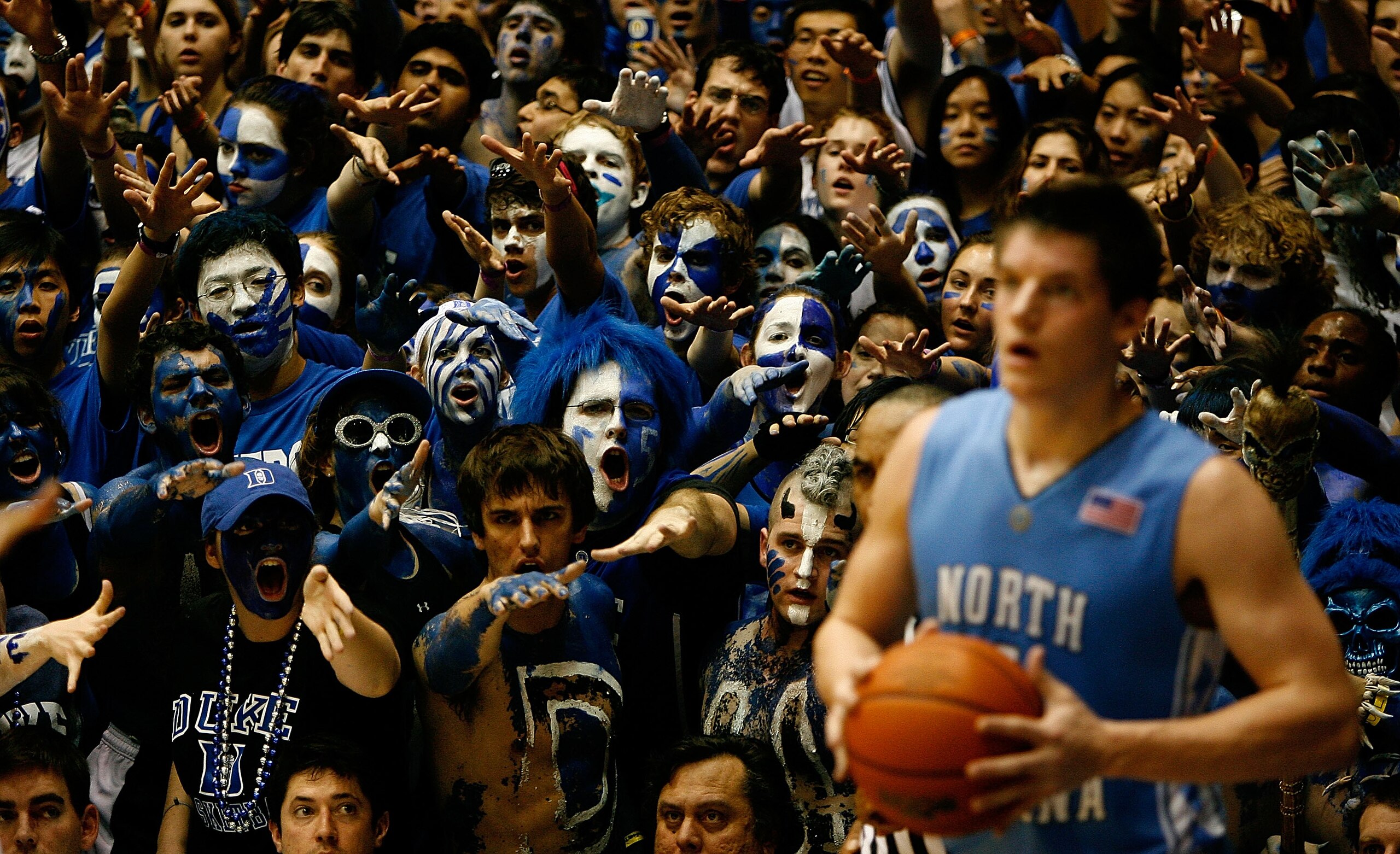 DURHAM, NC - FEBRUARY 11:  The Cameron Crazies of Duke taunt Bobby Frasor #4 of the North Carolina Tar Heels during their game on February 11, 2009 at Cameron Indoor Stadium in Durham, North Carolina.  (Photo by Kevin Cox/Getty Images)