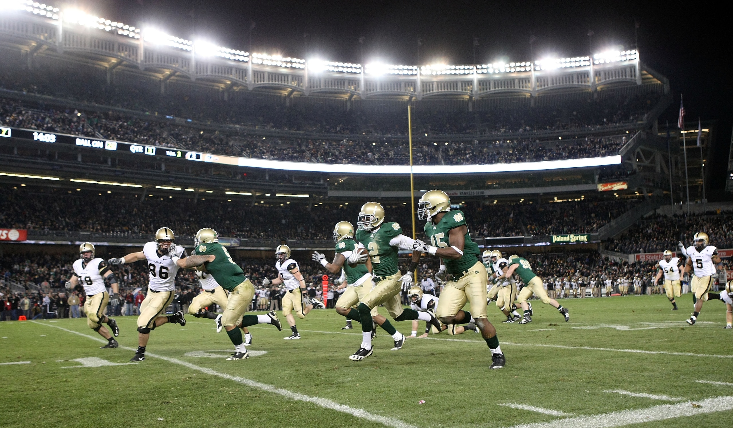 NEW YORK - NOVEMBER 20: Darrin Walls #2 of the Notre Dame Fighting Irish runs the ball in for a touchdown after an interception in the thrid quarter against the Army Black Knights at Yankee Stadium on November 20, 2010 in the Bronx borough of New York Cit