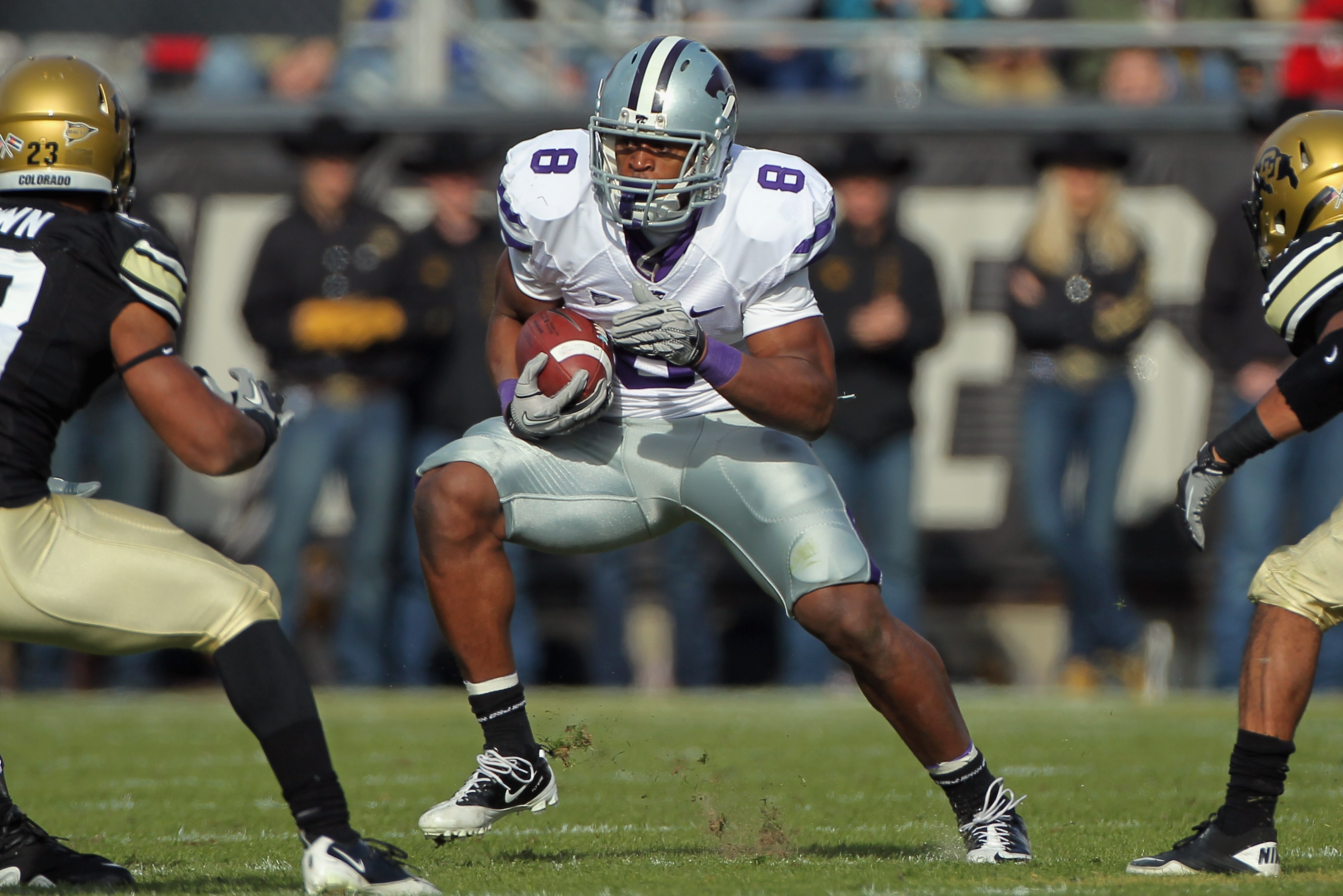 BOULDER, CO - NOVEMBER 20:  Daniel Thomas #8 of the Kansas State Wildcats rushes with the ball against the Colorado Buffaloes at Folsom Field on November 20, 2010 in Boulder, Colorado. Colorado defeated Kansas State 44-36.  (Photo by Doug Pensinger/Getty 