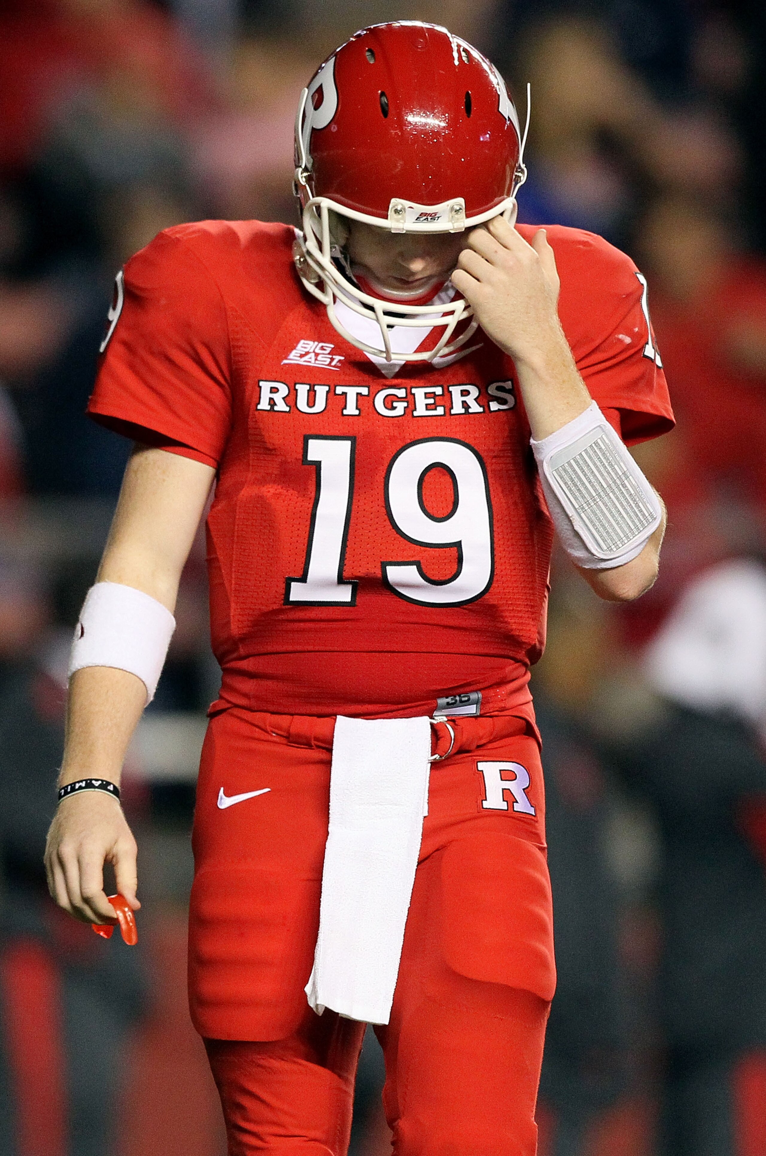 PISCATAWAY, NJ - OCTOBER 08:  Chas Dodd #19 of the Rutgers Scarlet Knights walks to the sidelines against the Connecticut Huskies at Rutgers Stadium on October 8, 2010 in Piscataway, New Jersey.  (Photo by Jim McIsaac/Getty Images)