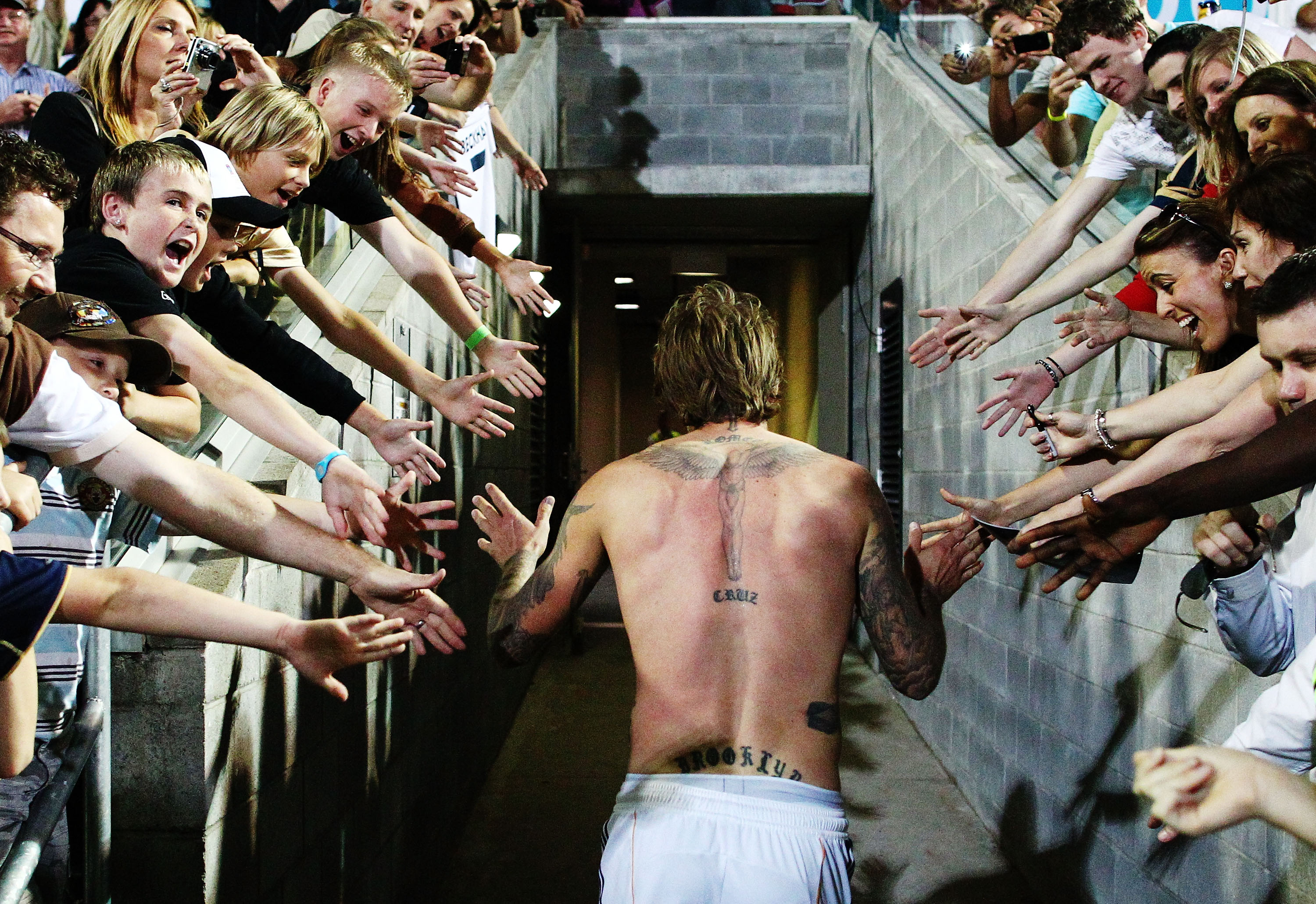 NEWCASTLE, AUSTRALIA - NOVEMBER 27: David Beckham of the Galaxy heads for the dressing room following the friendly match between the Newcastle Jets and the LA Galaxy at EnergyAustralia Stadium on November 27, 2010 in Newcastle, Australia.  (Photo by Brend