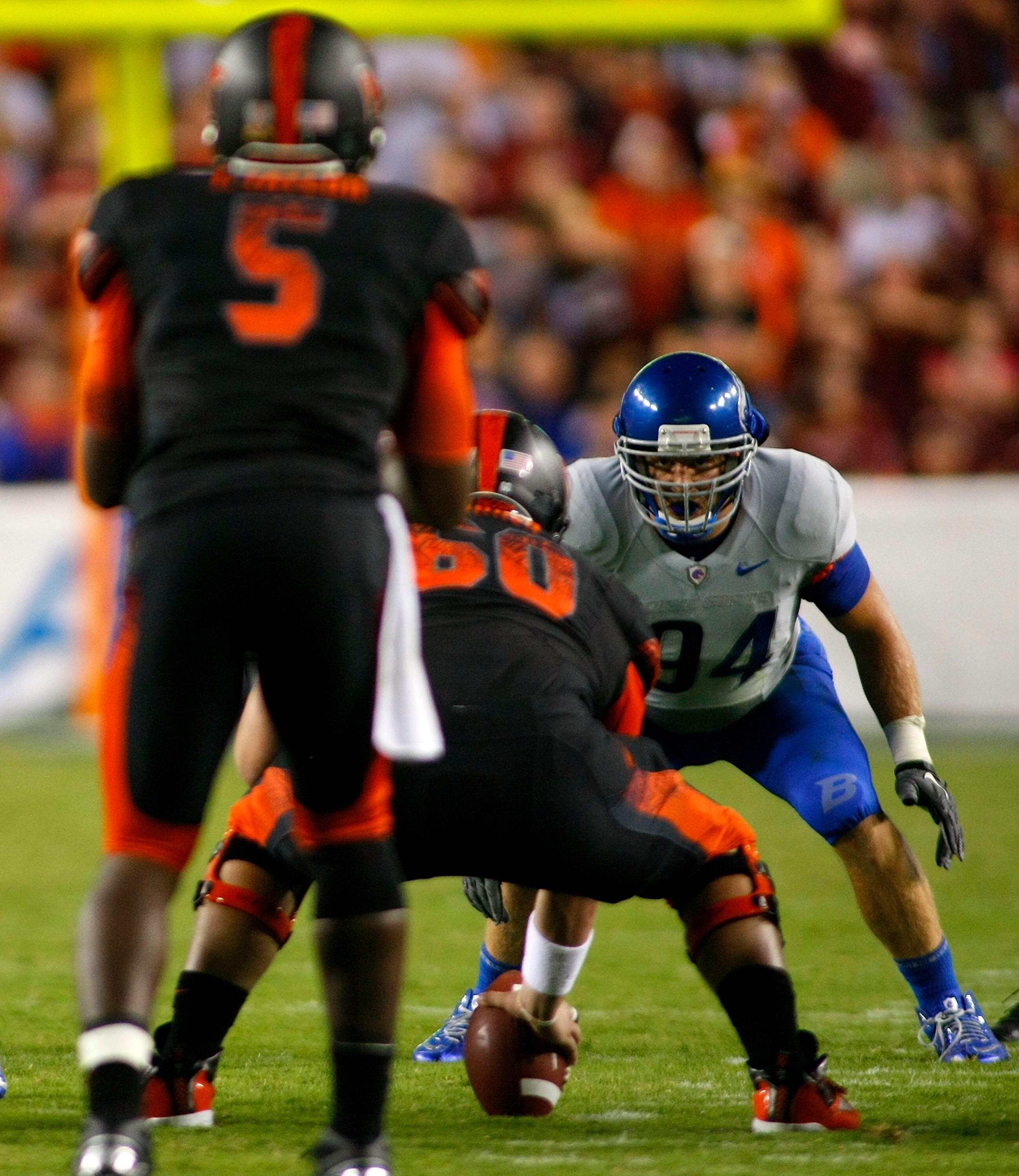 LANDOVER, MD - SEPTEMBER 06:  Linebacker Byron Hout #94 of the Boise State Broncos lines up as quarterback Tyrod Taylor #5 of the Virginia Tech Hokies prepares to take a snap at FedExField on September 6, 2010 in Landover, Maryland.  (Photo by Geoff Burke