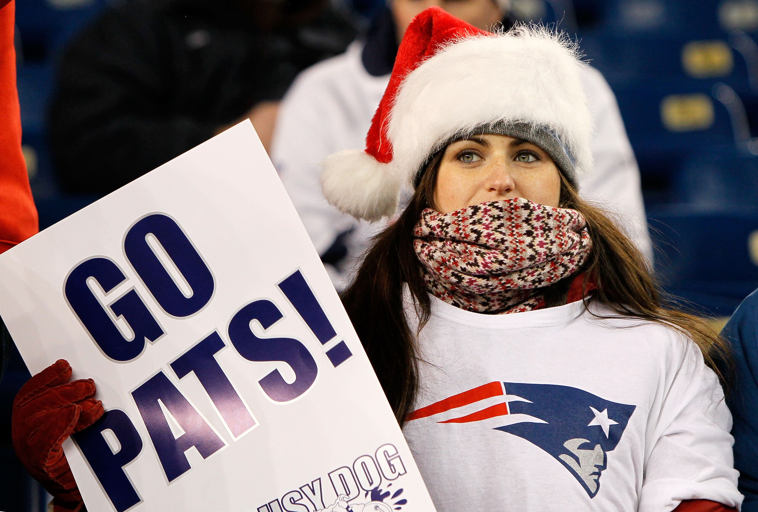 FOXBORO, MA - DECEMBER 19: A fan of the New England Patriots holds up a sign that reads 'Go Pats!' prior to the start of the game against the Green Bay Packers at Gillette Stadium on December 19, 2010 in Foxboro, Massachusetts. (Photo by Jim Rogash/Gett FOXBORO, MA - DECEMBER 19: A fan of the New England Patriots holds up a sign that reads 'Go Pats!' prior to the start of the game against the Green Bay Packers at Gillette Stadium on December 19, 2010 in Foxboro, Massachusetts. (Photo by Jim Rogash/Gett