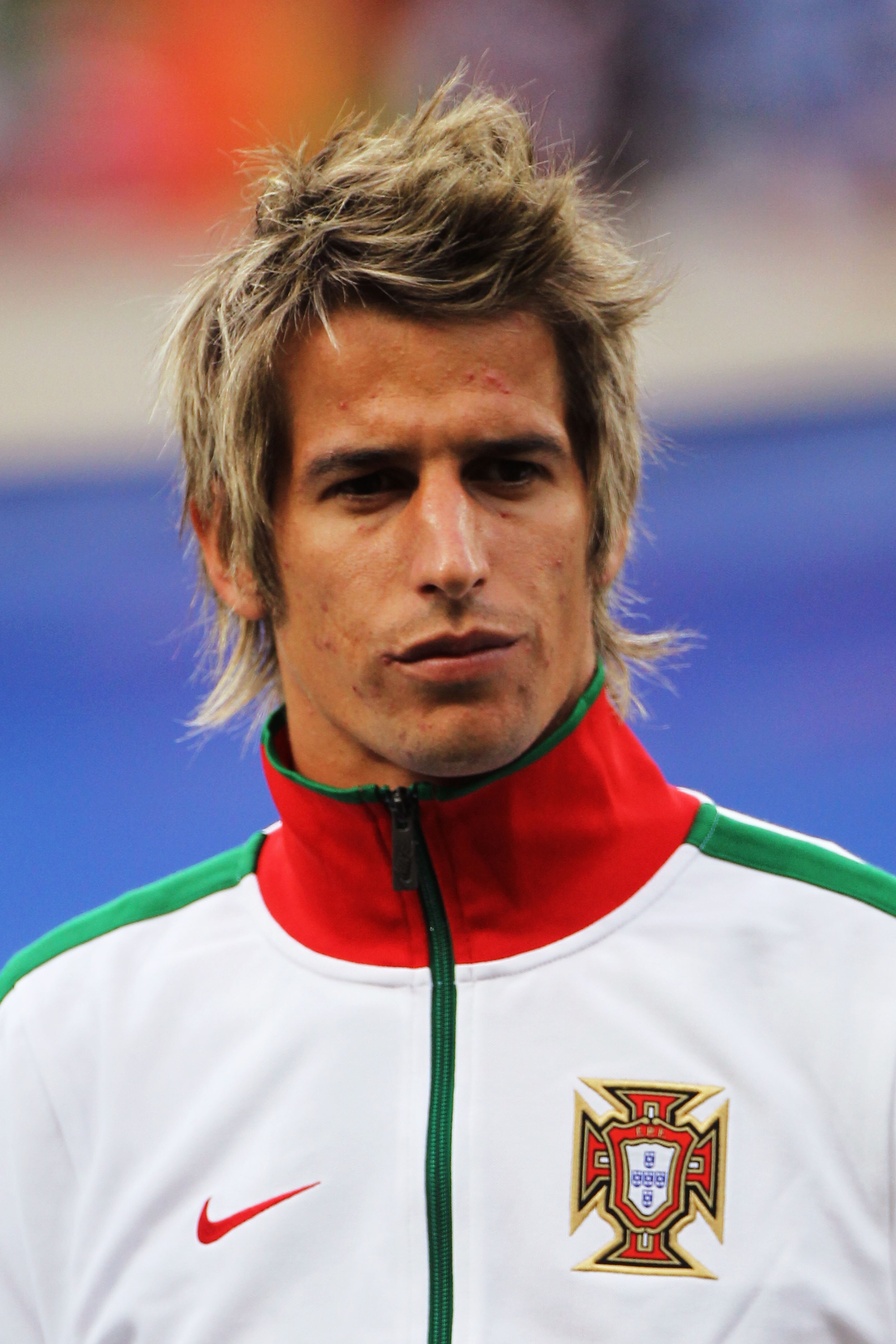 PORT ELIZABETH, SOUTH AFRICA - JUNE 15:  Fabio Coentrao of Portugal lines up for the national anthems prior to the 2010 FIFA World Cup South Africa Group G match between Ivory Coast and Portugal at Nelson Mandela Bay Stadium on June 15, 2010 in Port Eliza