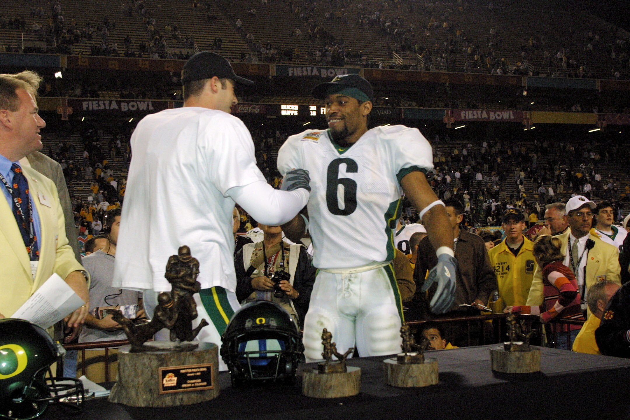 01 Jan 2002 : Steve Smith #6 of Oregon and quarterback Joey Hamilton congratulate eachother after defeating Colorado at the  Fiesta Bowl at Sun Devil Stadium in Tempe, Arizona. The Oregon Ducks won 38-16. DIGITAL IMAGE. Mandatory Credit: Jeff Gross/Getty
