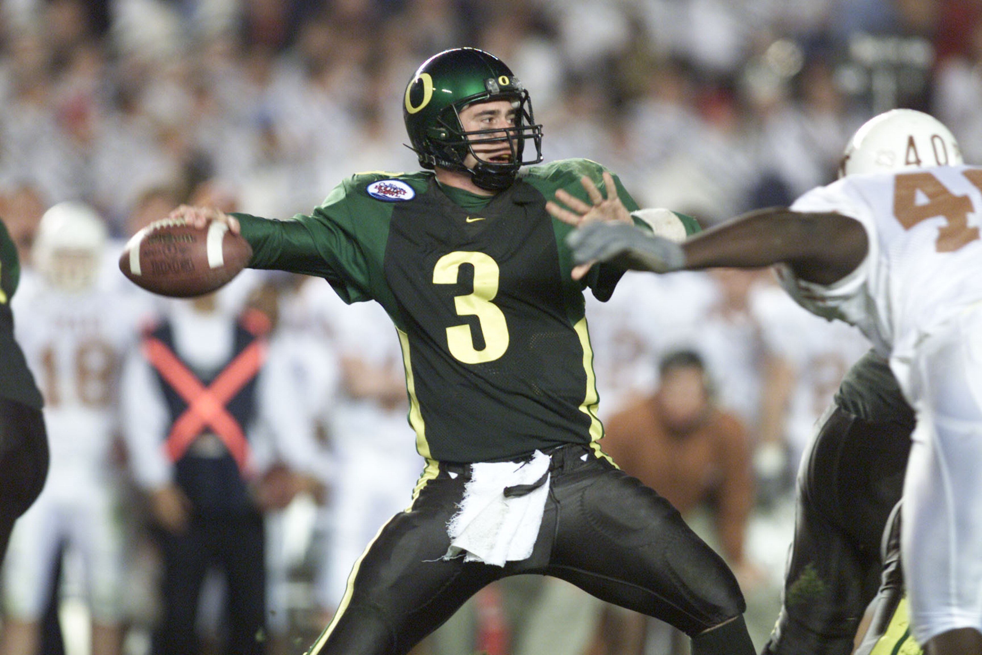 29 Dec 2000: Quarterback Joey Harrington #3 of the Oregon Ducks drops back to pass during the Culligan Holiday Bowl against the Texas Longhorns at Qualcomm Stadium in San Diego, California. DIGITAL IMAGE Mandatory Credit: Jeff Gross/ALLSPORT 29 Dec 2000: Quarterback Joey Harrington #3 of the Oregon Ducks drops back to pass during the Culligan Holiday Bowl against the Texas Longhorns at Qualcomm Stadium in San Diego, California. DIGITAL IMAGE Mandatory Credit: Jeff Gross/ALLSPORT