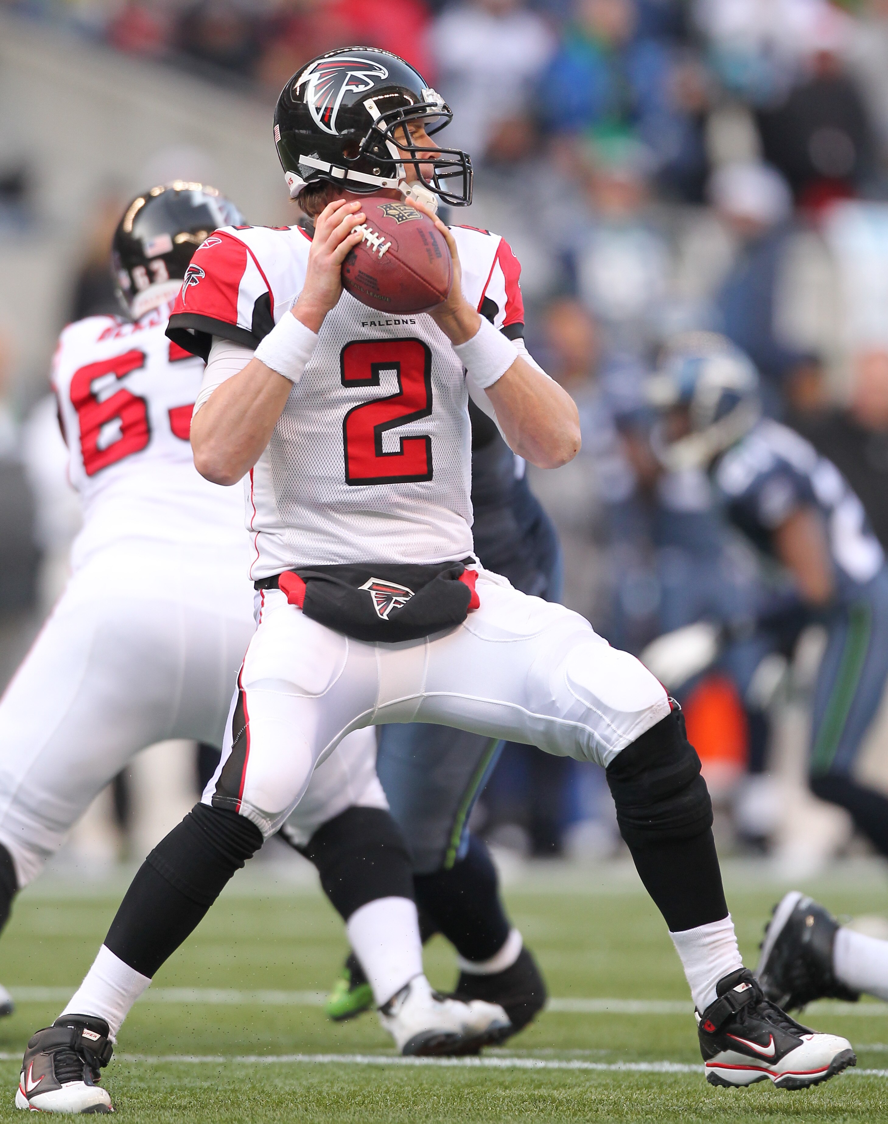 SEATTLE, WA - DECEMBER 19:  Quarterback Matt Ryan #2 of the Atlanta Falcons looks downfield against the Seattle Seahawks at Qwest Field on December 19, 2010 in Seattle, Washington. (Photo by Otto Greule Jr/Getty Images)