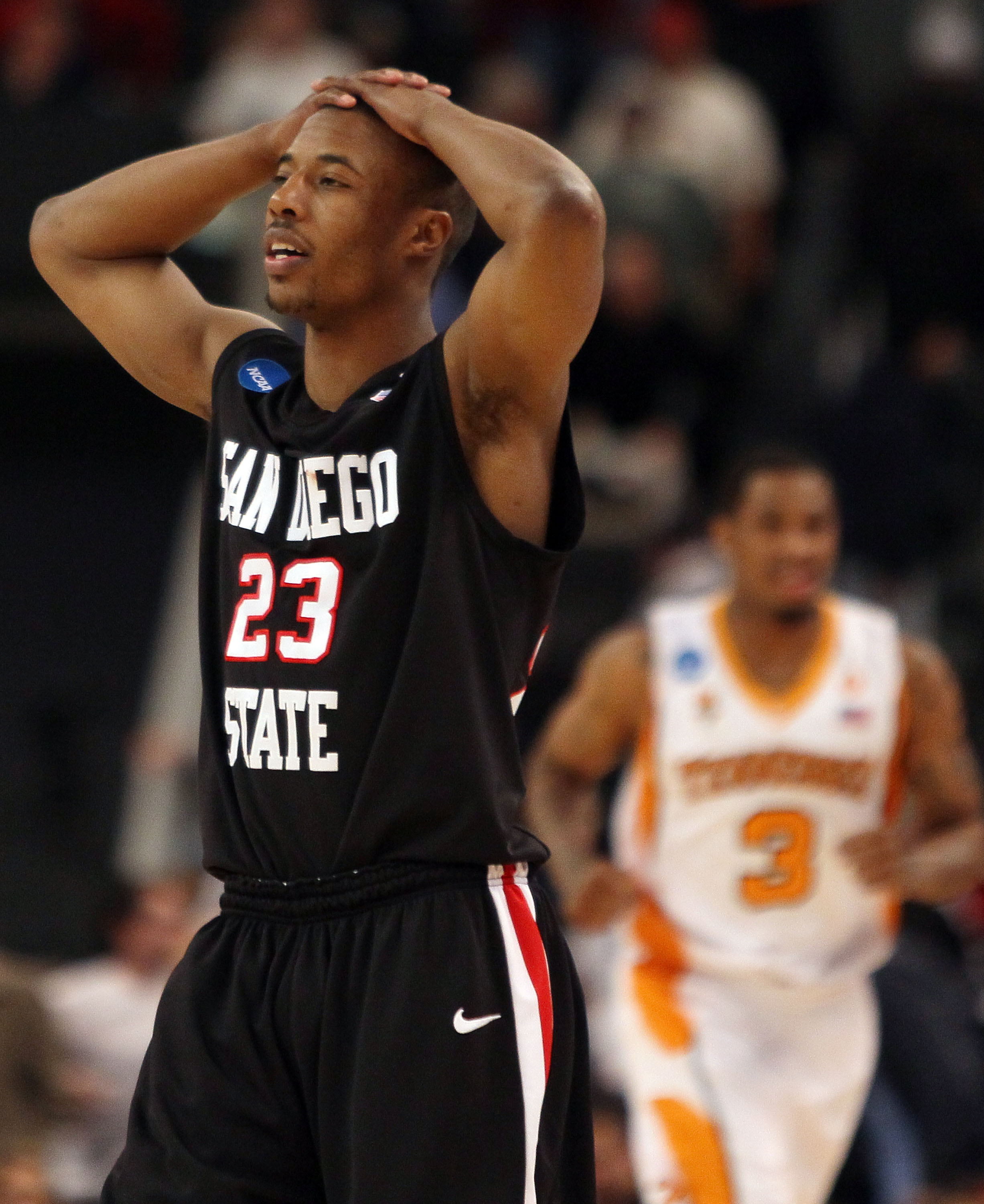 PROVIDENCE, RI - MARCH 18:  D.J. Gay #23 of the San Diego State Aztecs reacts after the loss to the Tennessee Volunteers during the first round of the 2010 NCAA men's basketball tournament on March 19, 2010 at the Dunkin Donuts Arena in Providence, Rhode