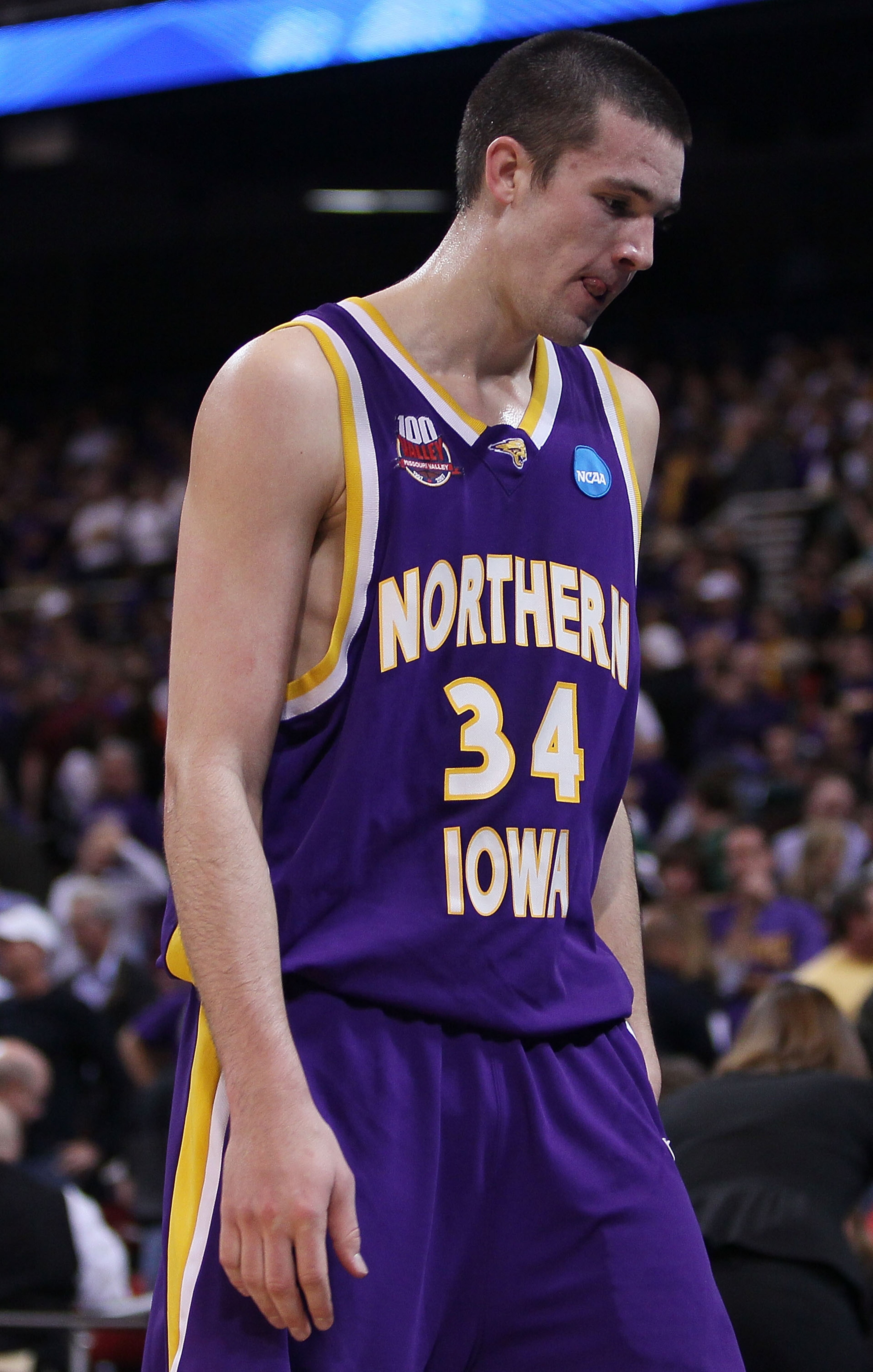 ST. LOUIS - MARCH 26:  Adam Koch #34 of the Northern Iowa Panthers walks off the court after losing to the Michigan State Spartans during the midwest regional semifinal of the 2010 NCAA men's basketball tournament at the Edward Jones Dome on March 26, 201