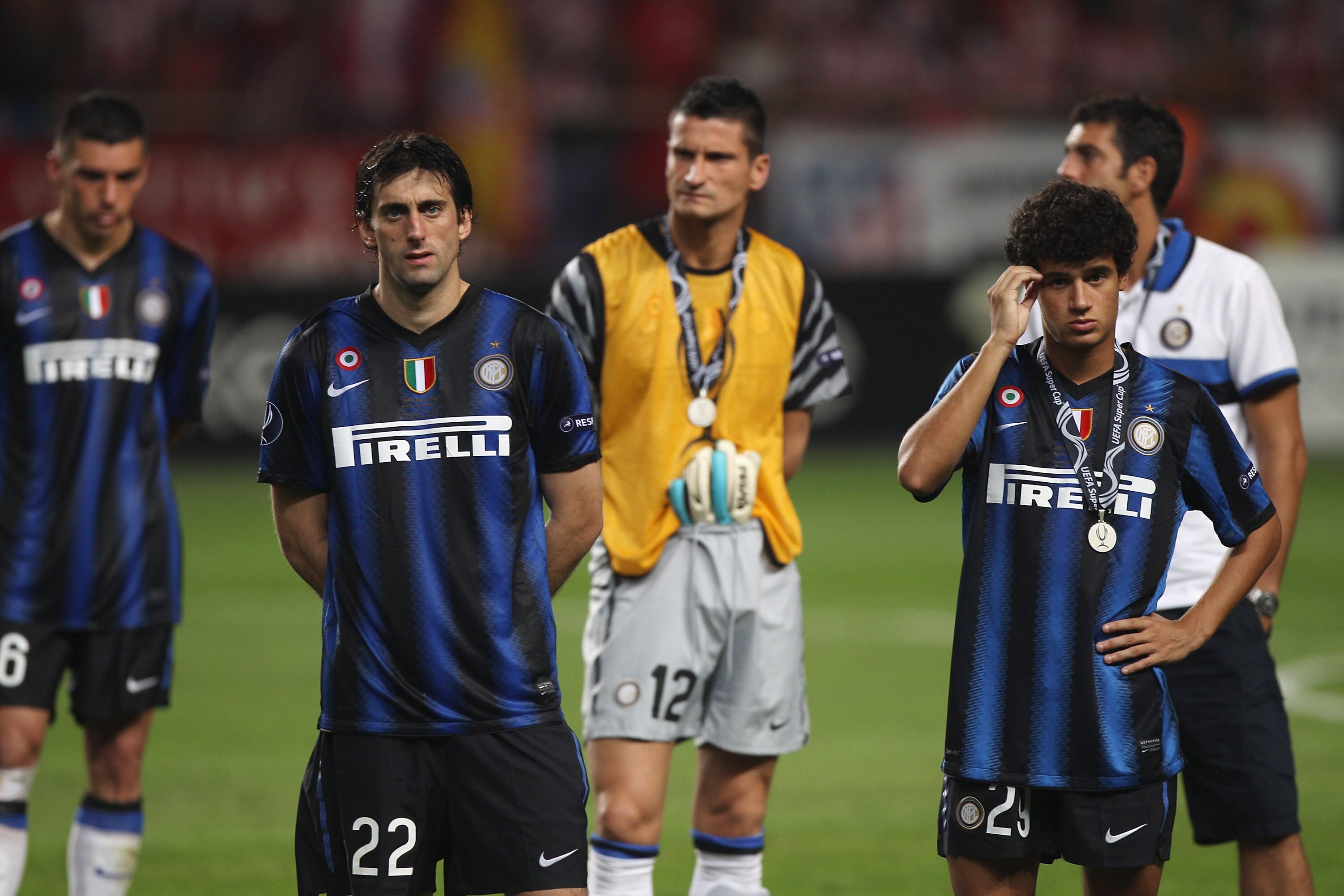 MONACO - AUGUST 27: Diego Milito (centre L) and Coutinho (R) and Inter Milan team-mates stand dejected after their team's 0-2 defeat at the end of the UEFA Super Cup match between Inter Milan and Atletico Madrid at Louis II Stadium on August 27, 2010 in M