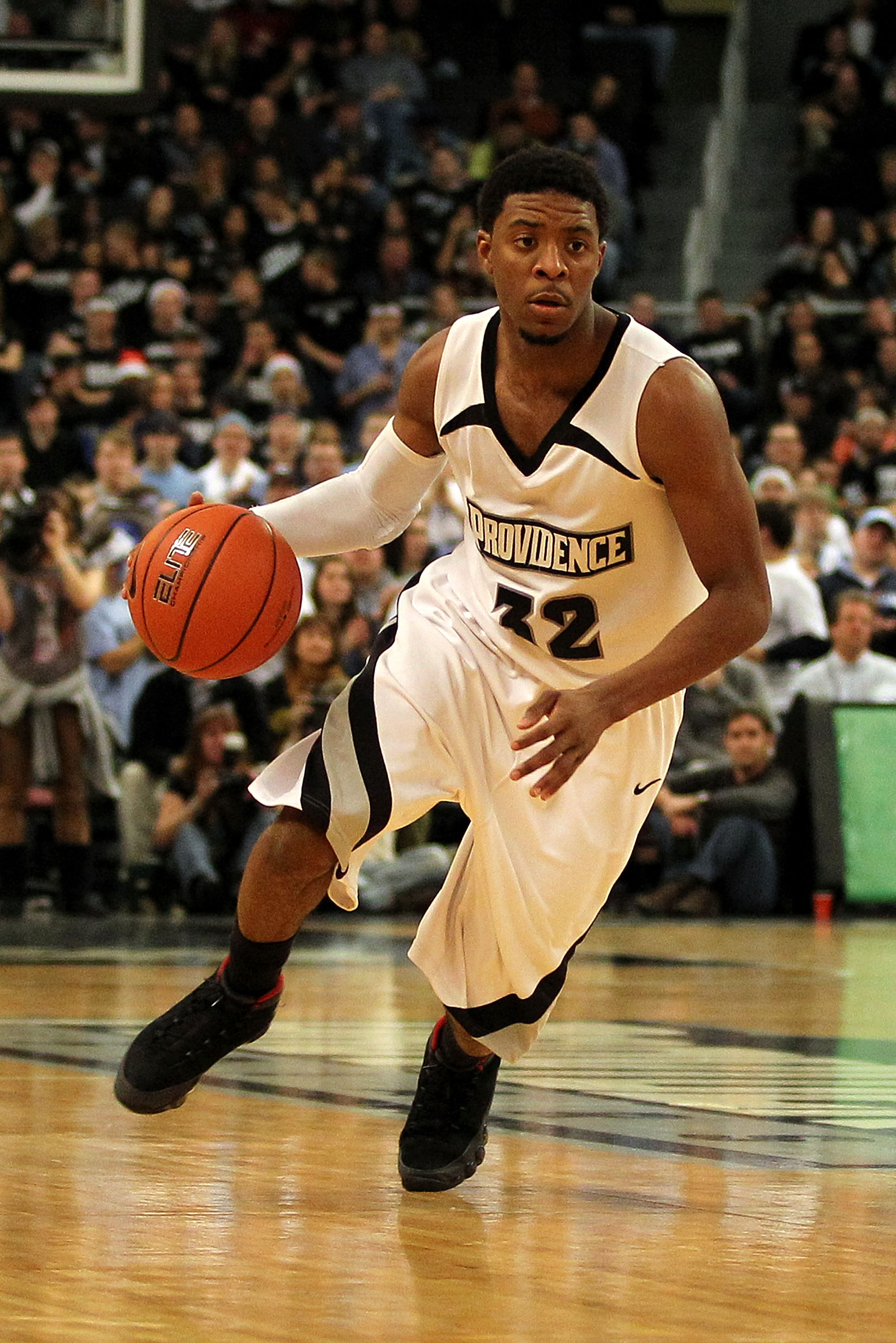 PROVIDENCE, RI - DECEMBER 04:  Vincent Council #32 of the Providence Friars drives against the Rhode Island Rams at the Dunkin' Donuts Center on December 4, 2010 in Providence, Rhode Island.  (Photo by Chris Chambers/Getty Images)