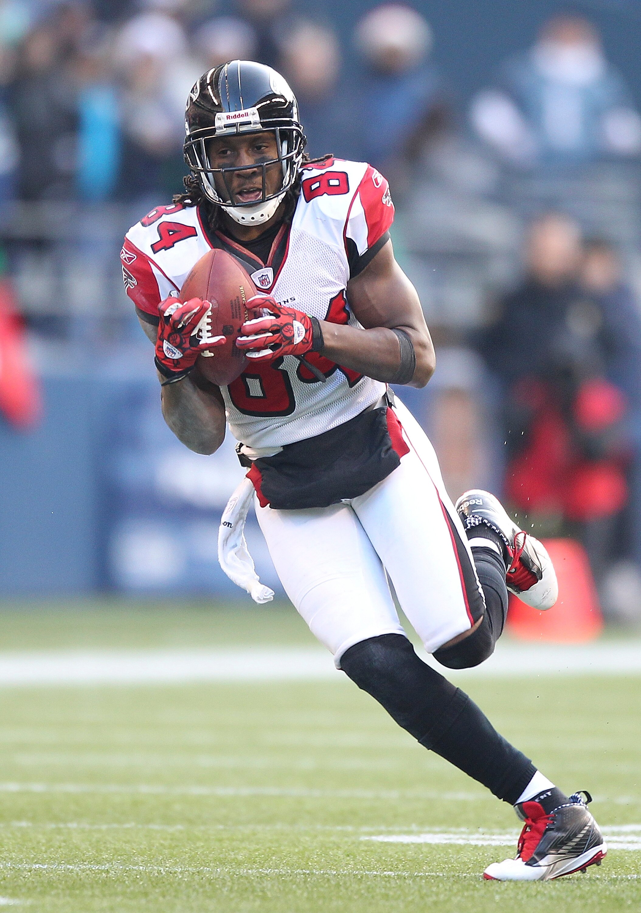 SEATTLE, WA - DECEMBER 19:  Wide receiver Roddy White #84 of the Atlanta Falcons rushes against the Seattle Seahawks at Qwest Field on December 19, 2010 in Seattle, Washington. The Falcons defeated the Seahawks 34-18. (Photo by Otto Greule Jr/Getty Images