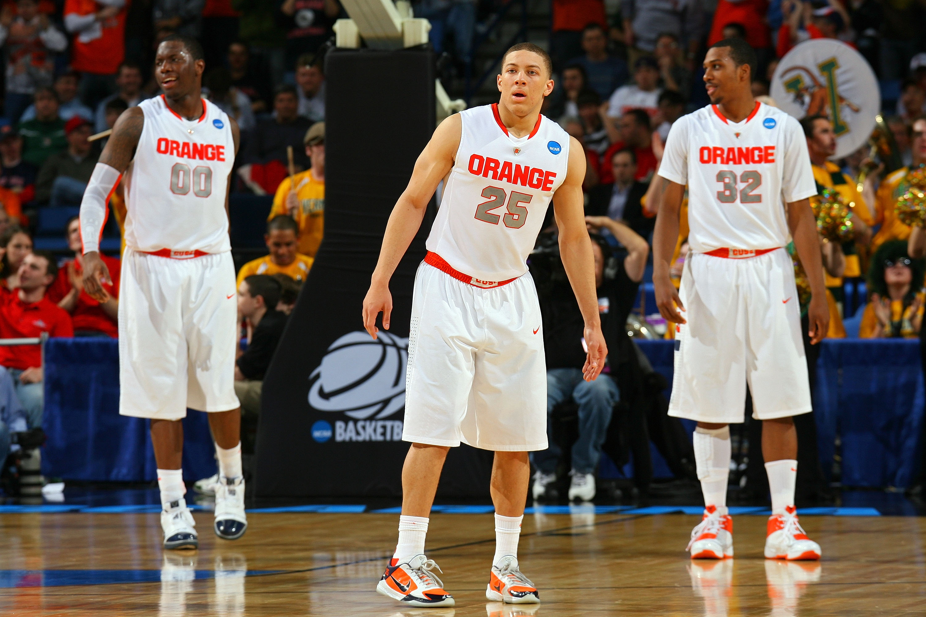 BUFFALO, NY - MARCH 19:  Rick Jackson #00, Brandon Triche #25 and Kris Joseph #32 of the Syracuse Orange look on against the Vermont Catamounts during the first round of the 2010 NCAA men's basketball tournament at HSBC Arena on March 19, 2010 in Buffalo,