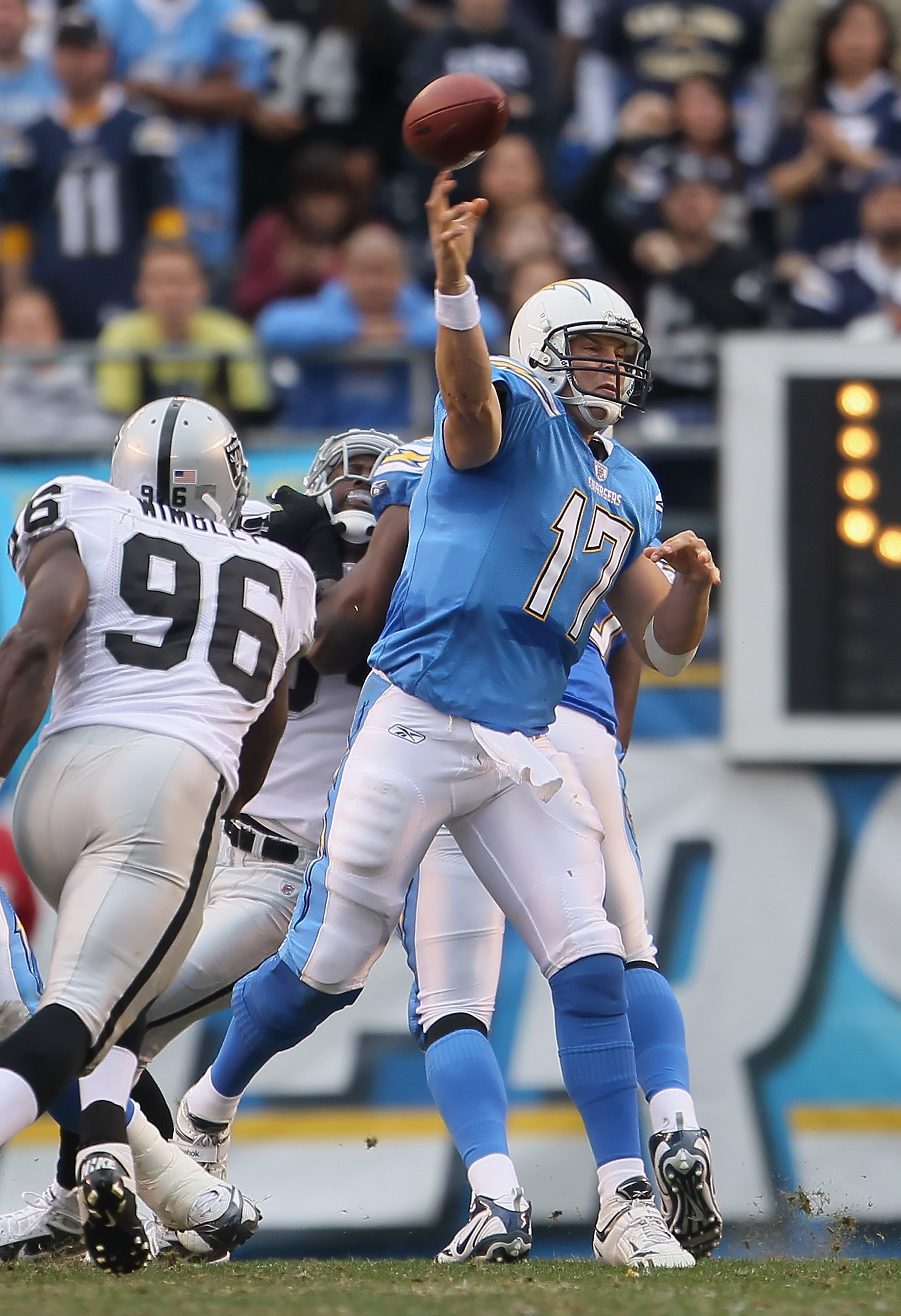 SAN DIEGO - DECEMBER 05:  Quarterback Philip Rivers #17 of the San Diego Chargers drops back to pass against the Oakland Raiders at Qualcomm Stadium on December 5, 2010 in San Diego, California. The Raiders defeated the Chargers 28-13.  (Photo by Jeff Gro