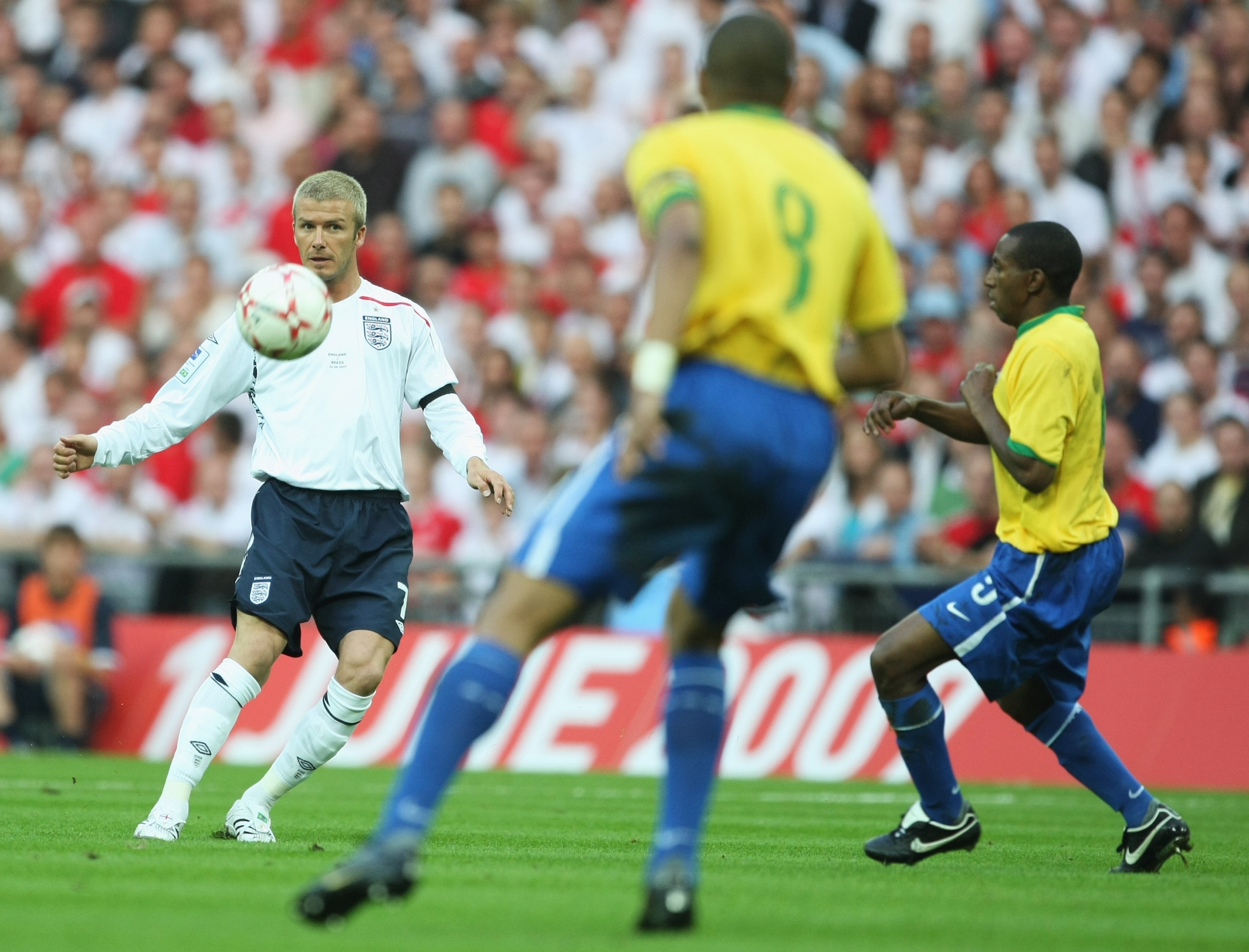 LONDON - JUNE 01: David Beckham of England passes the ball forward during the International Friendly match between England and Brazil at Wembley Stadium on June 1, 2007 in London, England. (Photo by Clive Mason/Getty Images) LONDON - JUNE 01: David Beckham of England passes the ball forward during the International Friendly match between England and Brazil at Wembley Stadium on June 1, 2007 in London, England. (Photo by Clive Mason/Getty Images)