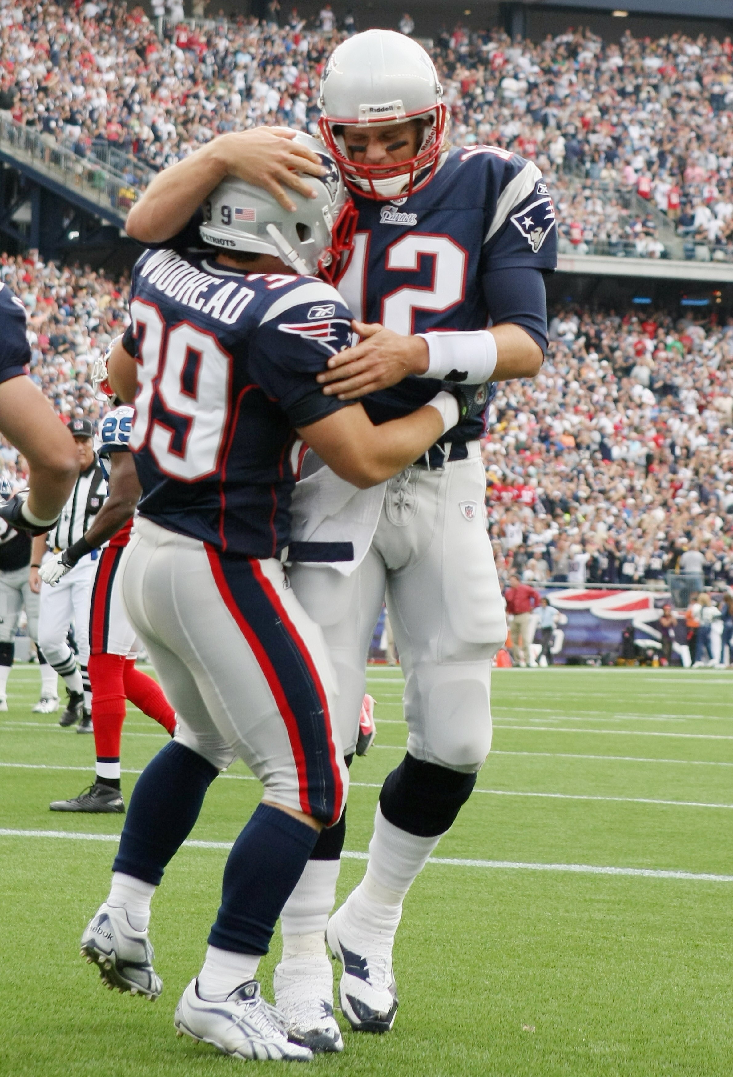 FOXBORO, MA - SEPTEMBER 26:  Danny Woodhead #39 of the New England Patriots is congratulated by teammate Tom Brady #12 after Woodhead ran the ball in for a touchdown in the second quarter against the Buffalo Bills during on September 26, 2010 at Gillette