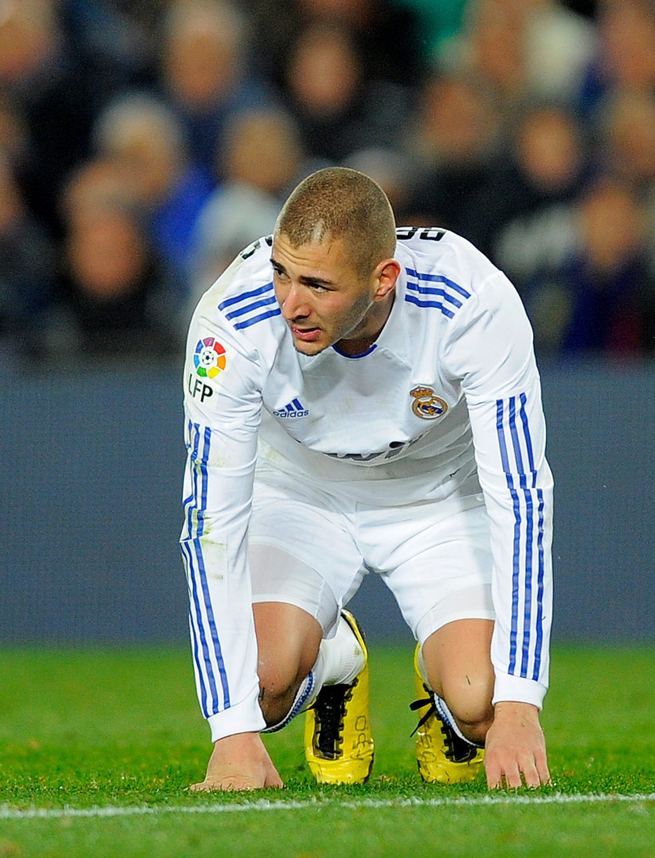 BARCELONA, SPAIN - NOVEMBER 29:  Karim Benzema of Real Madrid looks on during the La Liga match between Barcelona and Real Madrid at the Camp Nou Stadium on November 29, 2010 in Barcelona, Spain. Barcelona won the match 5-0.  (Photo by David Ramos/Getty I