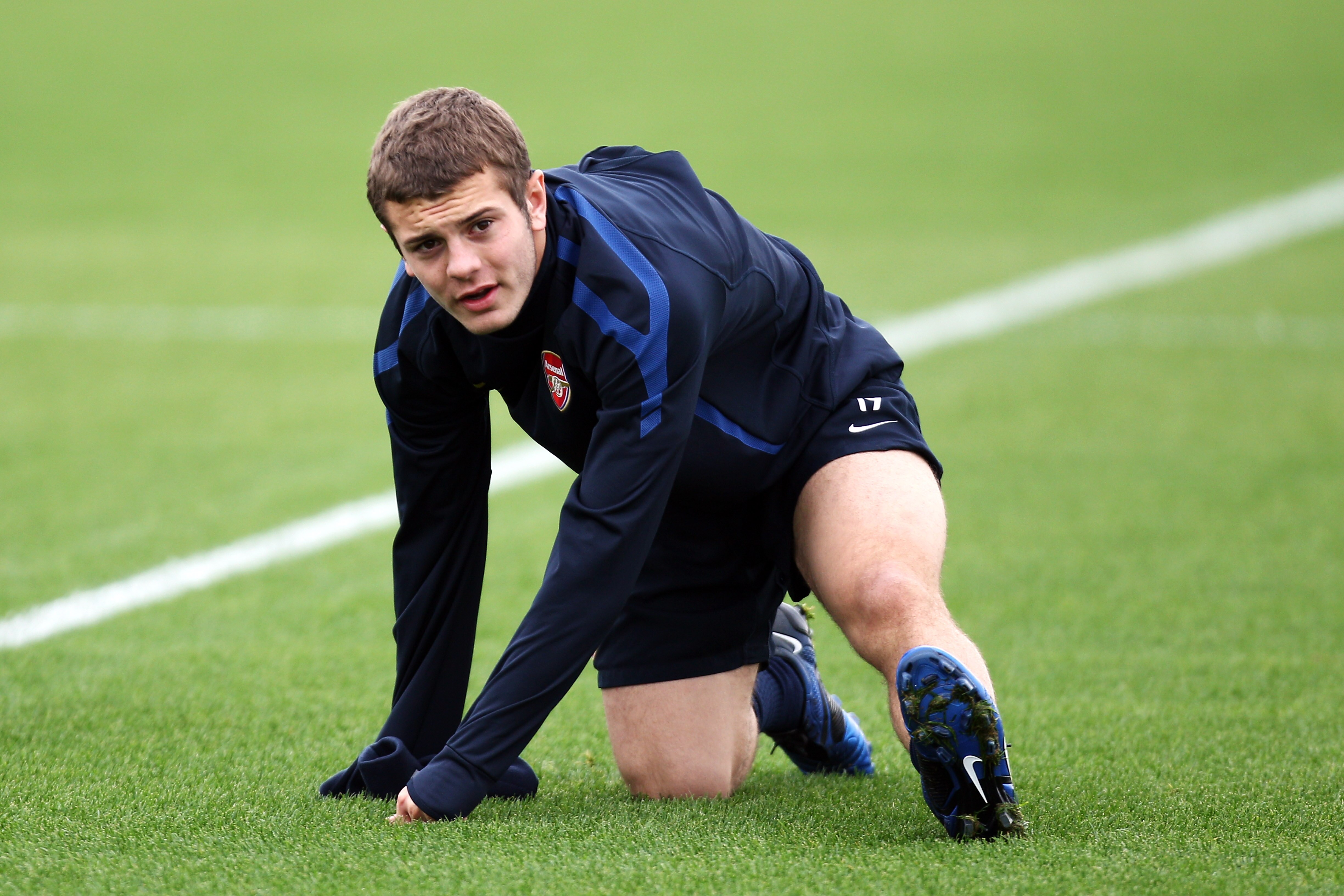 ST ALBANS, ENGLAND - NOVEMBER 02:  Jack Wilshere warms up during a training session ahead of the UEFA Champions League Group H match against Shakhtar Donetsk at the club's complex at London Colney on November 2, 2010 in St Albans, England.  (Photo by Dean