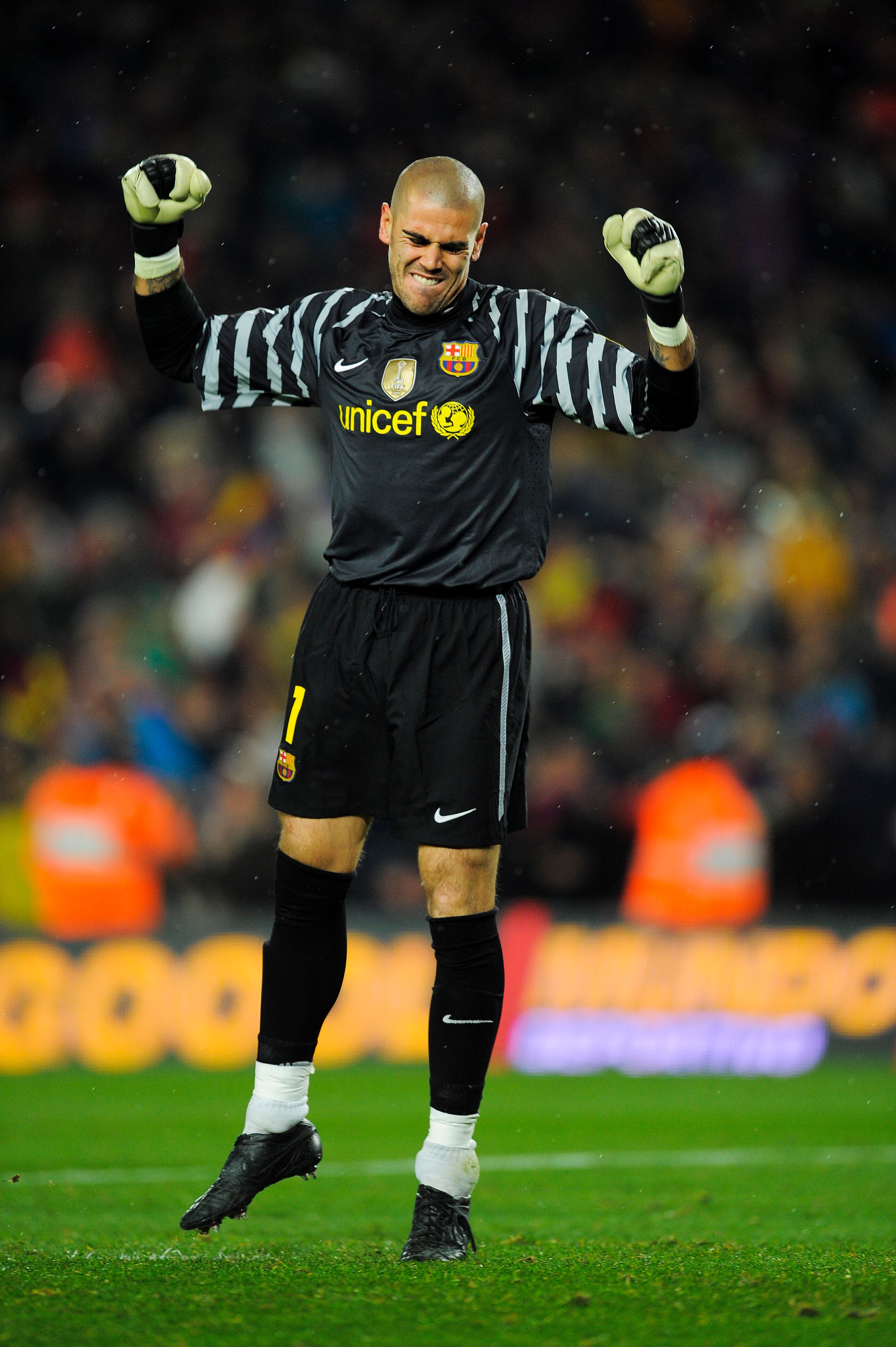 BARCELONA, SPAIN - NOVEMBER 29:  Victor Valdes of Barcelona celebrates after David Villa scored his second goal during the La Liga match between Barcelona and Real Madrid at the Camp Nou Stadium on November 29, 2010 in Barcelona, Spain.  Barcelona won the