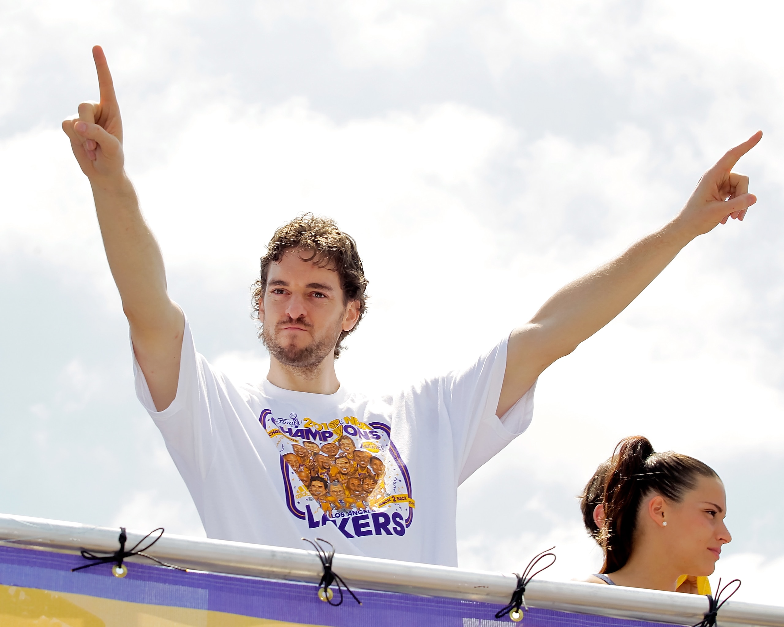 LOS ANGELES, CA - JUNE 21:  Los Angeles Lakers forward Pau Gasol salutes the crowd while riding in the victory parade for the the NBA basketball champion team on June 21, 2010 in Los Angeles, California. The Lakers beat the Boston Celtics 87-79 in 7 games