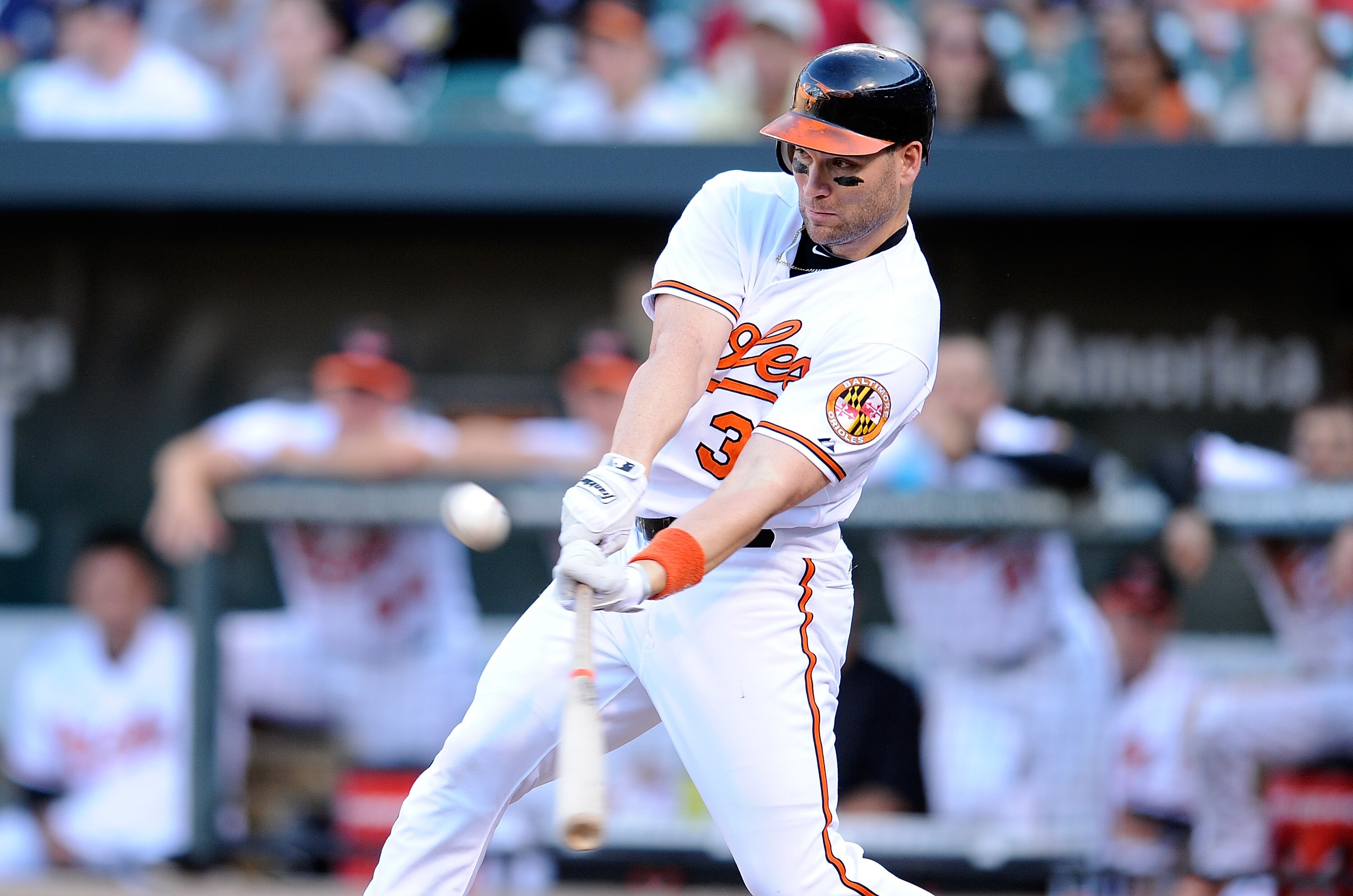 BALTIMORE - SEPTEMBER 19:  Luke Scott #30 of the Baltimore Orioles hits a double in the eleventh inning against the New York Yankees at Camden Yards on September 19, 2010 in Baltimore, Maryland. The Orioles won the game 4-3.  (Photo by Greg Fiume/Getty Im