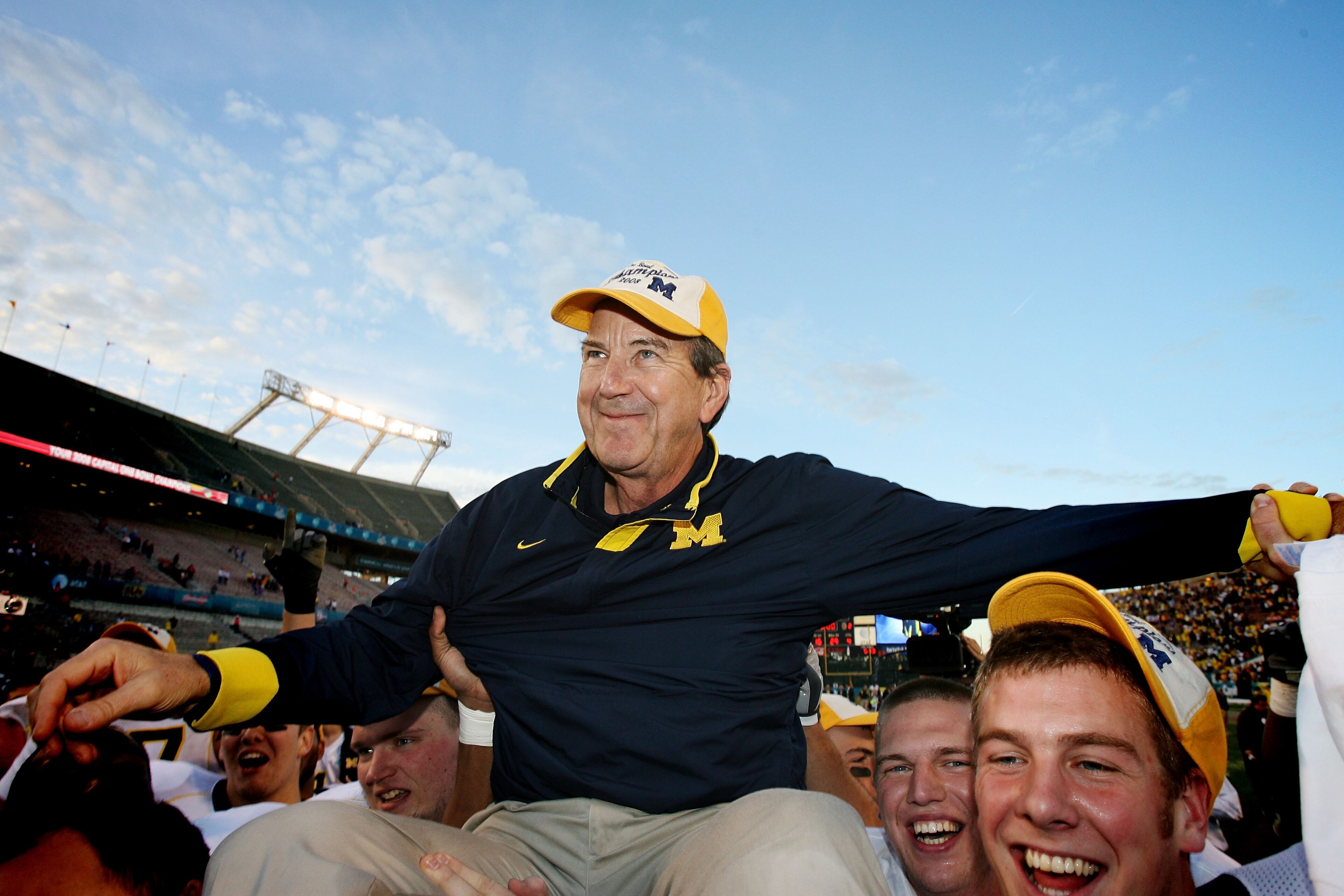 ORLANDO, FL - JANUARY 01:  Head coach Lloyd Carr of the Michigan Wolverines is carried off the field after ending his coaching career with a victory over the Florida Gators in the Capital One Bowl at Florida Citrus Bowl on January 1, 2008 in Orlando, Flor